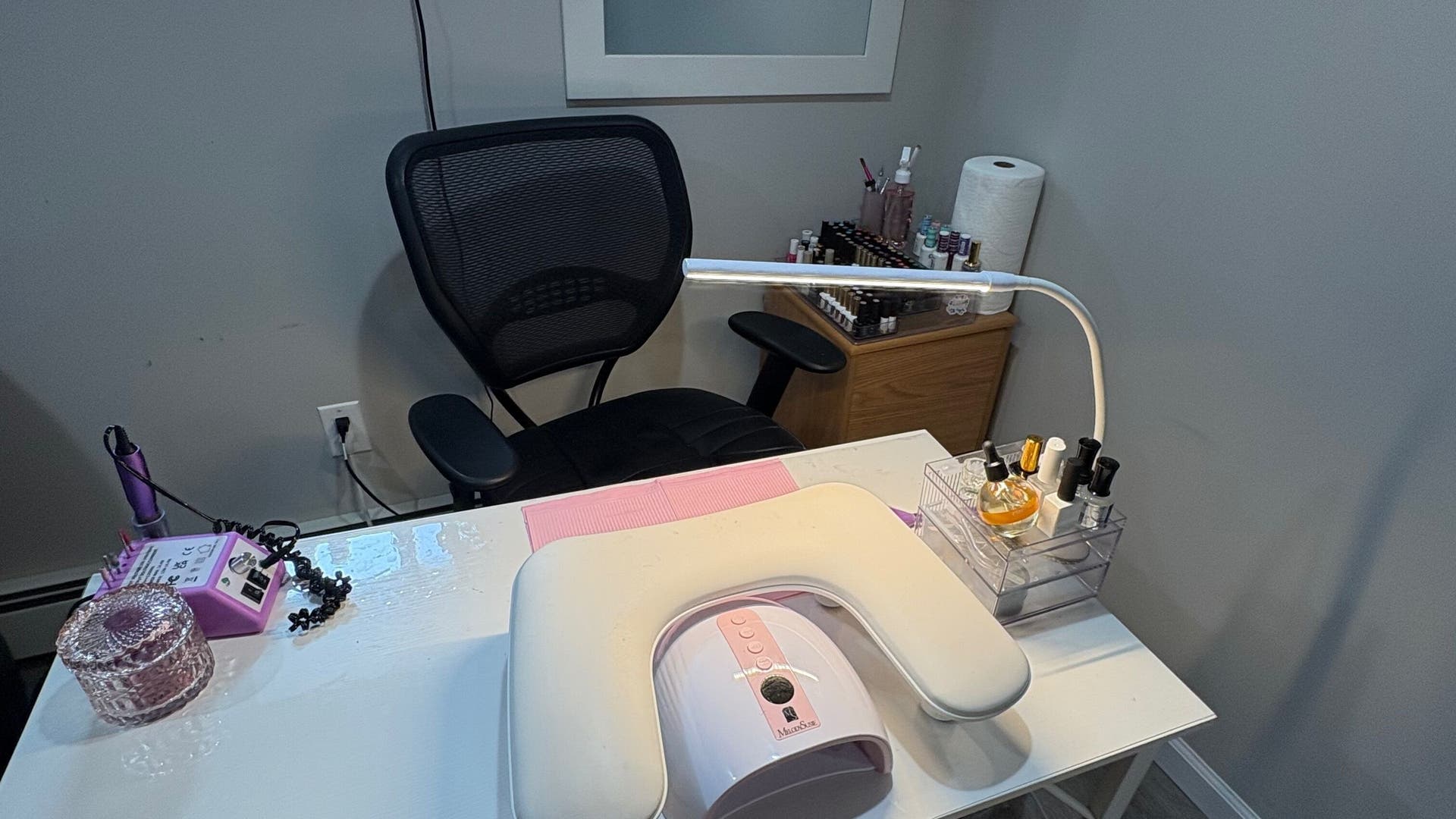 Darlenenails nail station setup in Copiague, New York, US, featuring a modern manicure table and equipment.