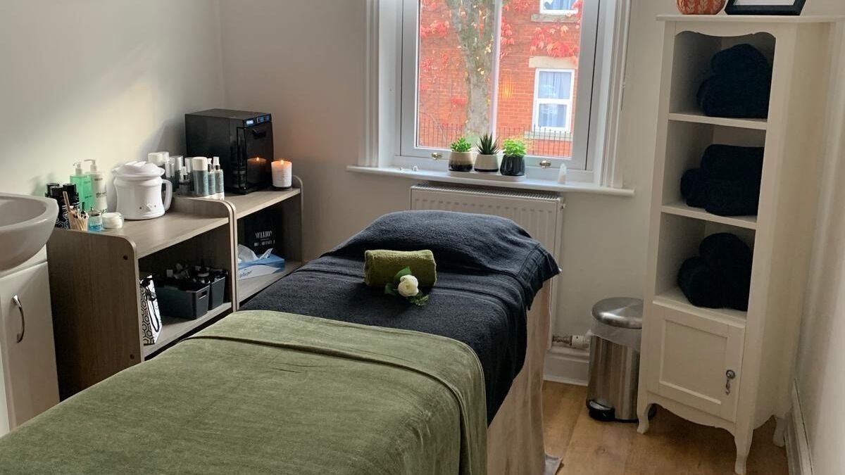 Relaxing spa treatment room with cozy decor at Rejuvenate in Carlisle, England, GB.