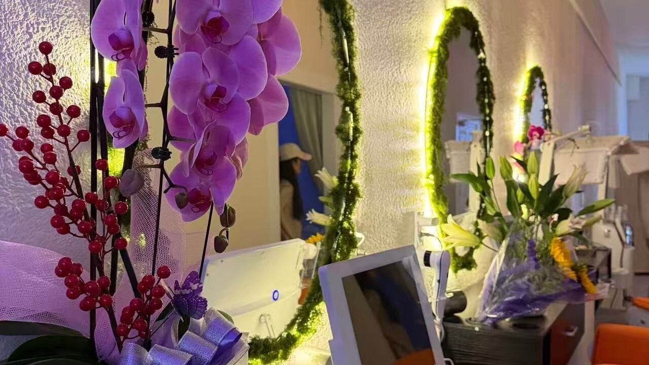 Elegant orchids and floral decor at M2 Spa in Temple City, California, US enhance the soothing atmosphere.