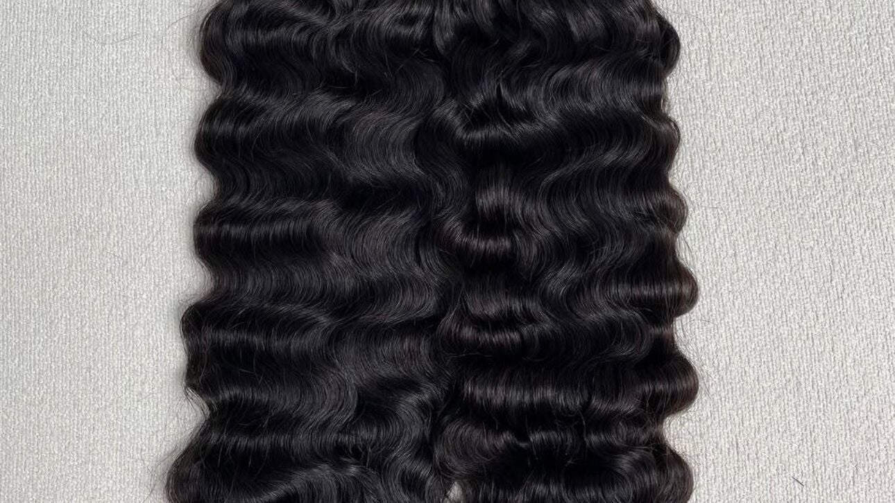 Luxurious wavy hair extensions at Sleek & Strand, Melbourne, Victoria, AU.