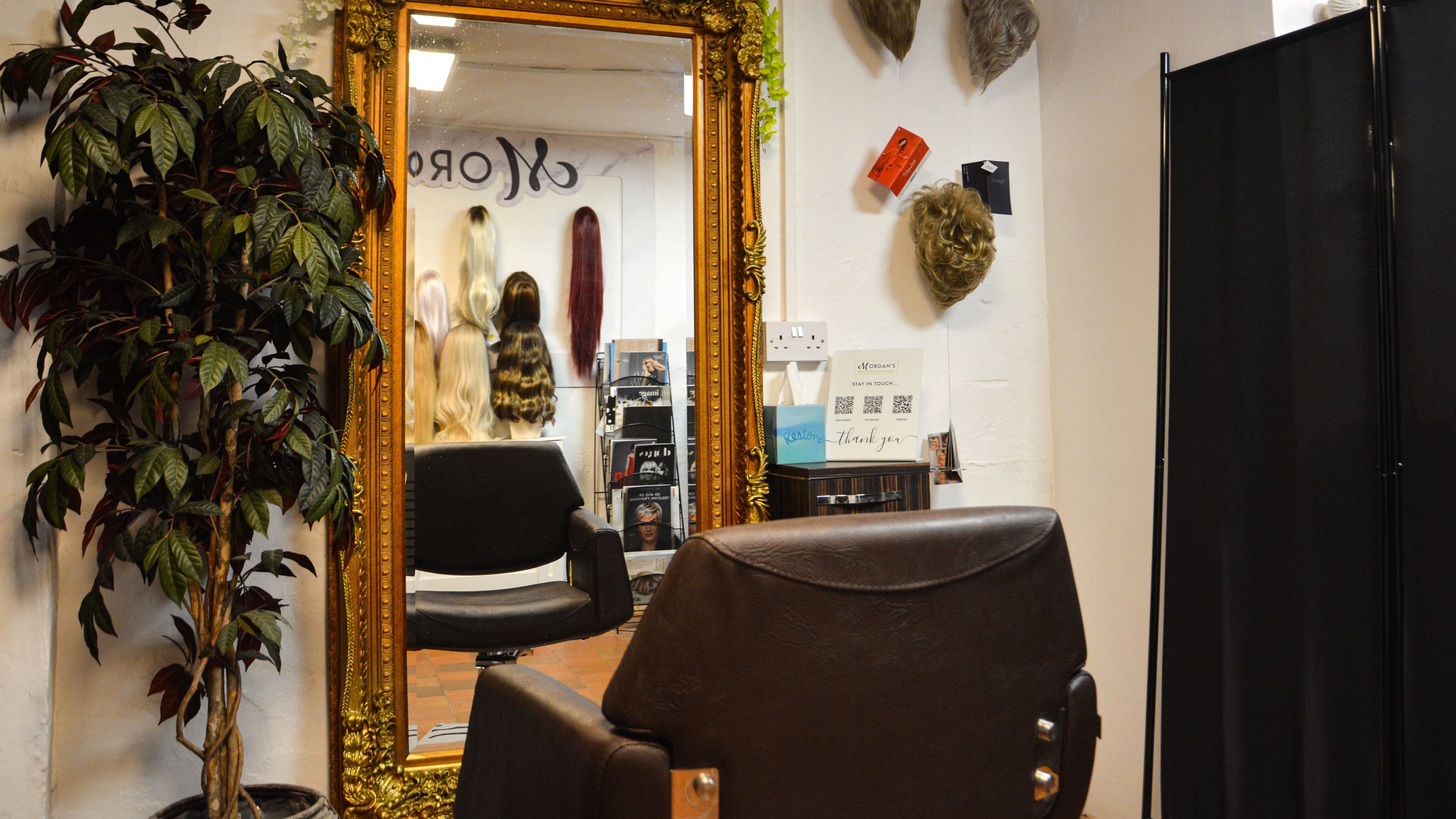 Elegant salon interior at Morgan's Wigs and Hair Loss Solutions Chester, showcasing wigs and styling area in Chester, England, GB.