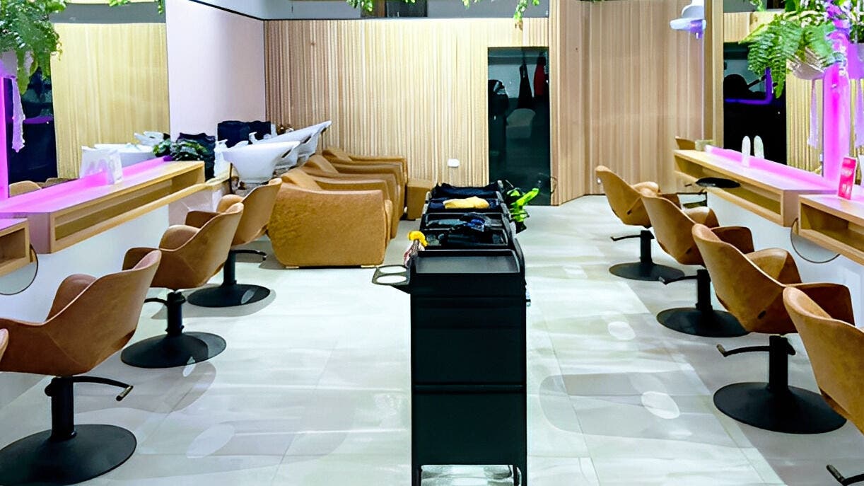 Interior of XO HAIR CO. in Melbourne, Victoria, AU, featuring modern salon chairs and stylish decor.