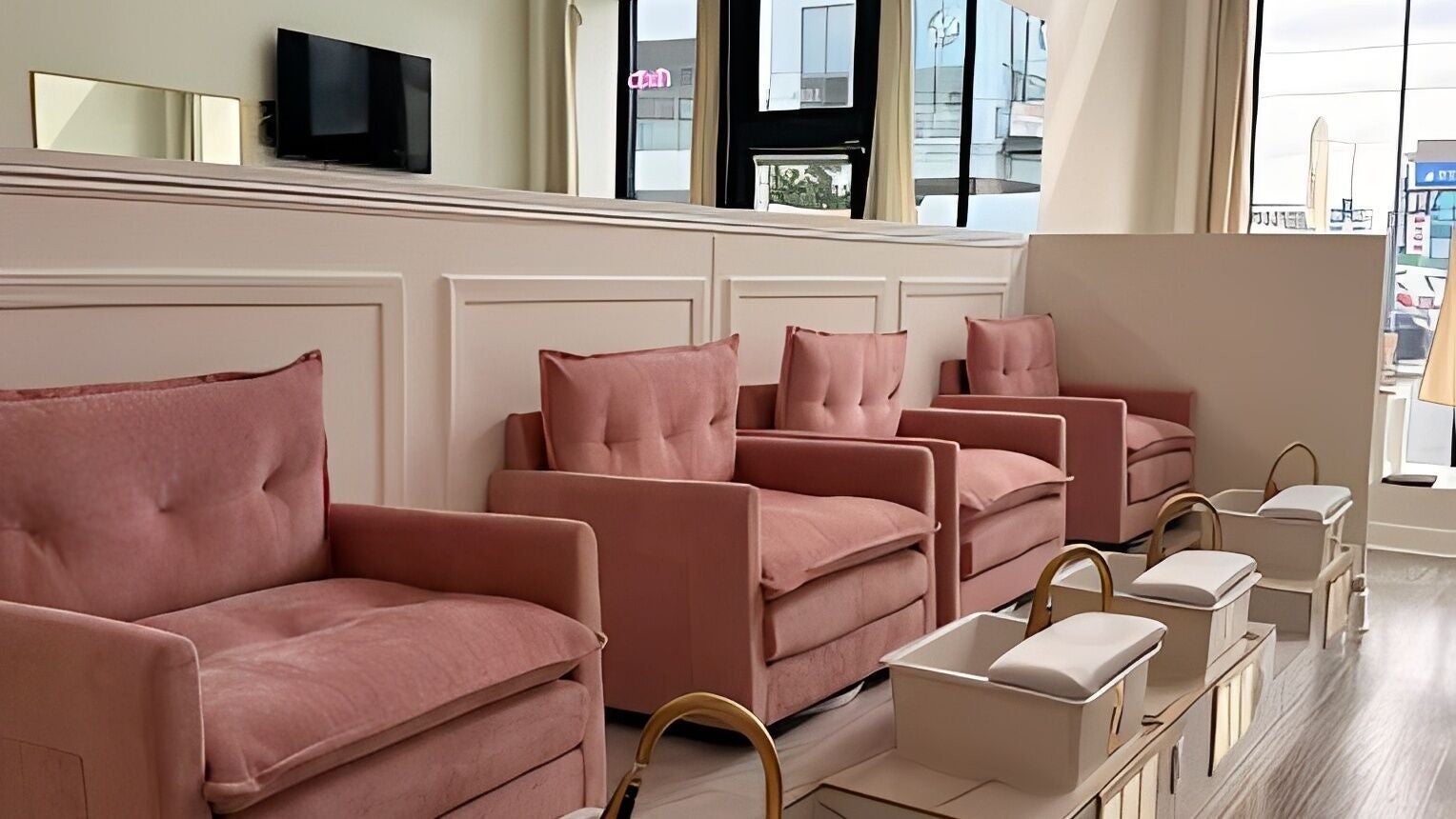 Elegant pink seating at Politur Nails Beauty Lounge 2, Los Angeles, CA, offering luxurious pampering services.
