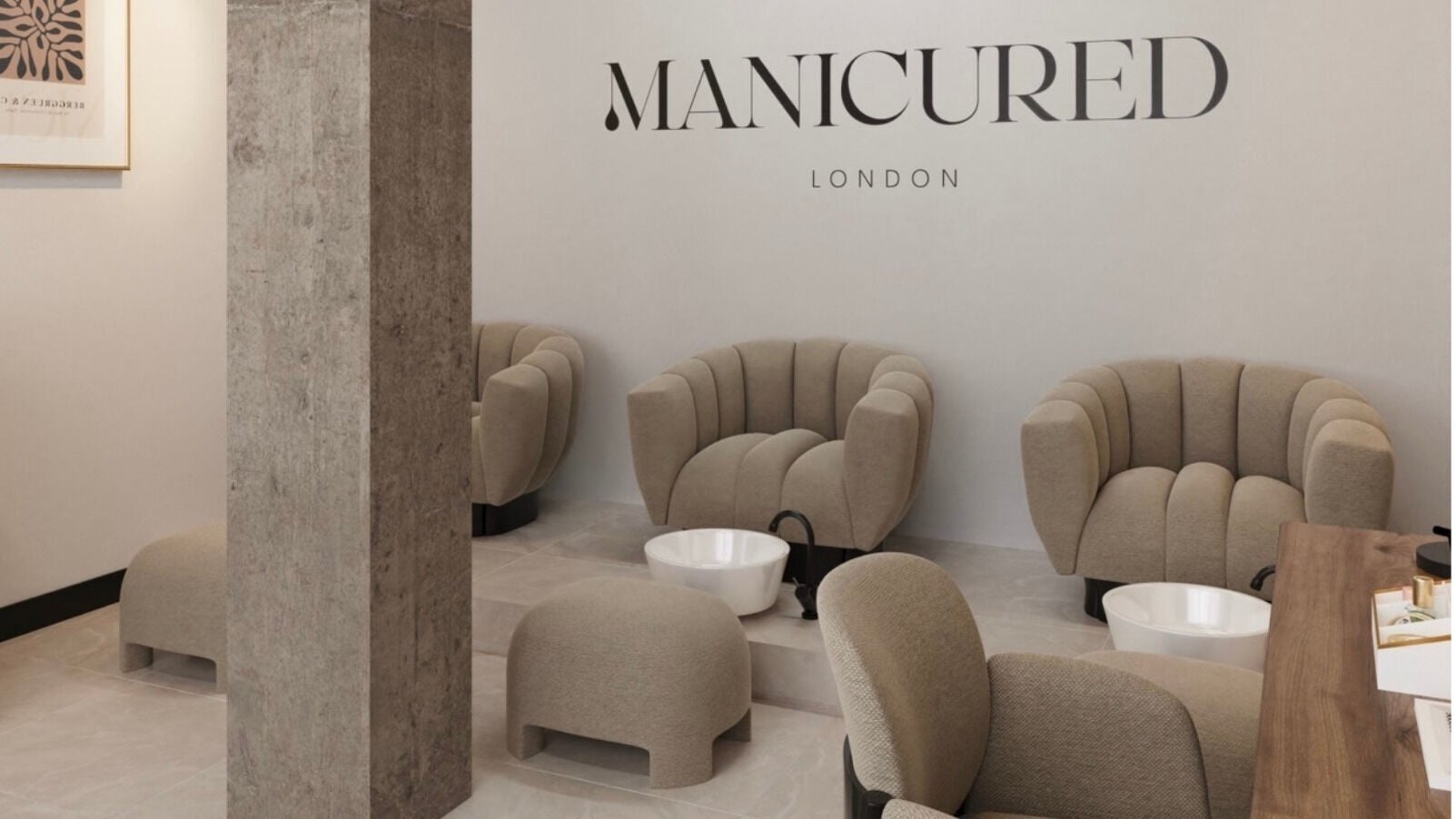 Cozy seating area of Manicured London in London, England, GB, featuring plush chairs and modern decor.