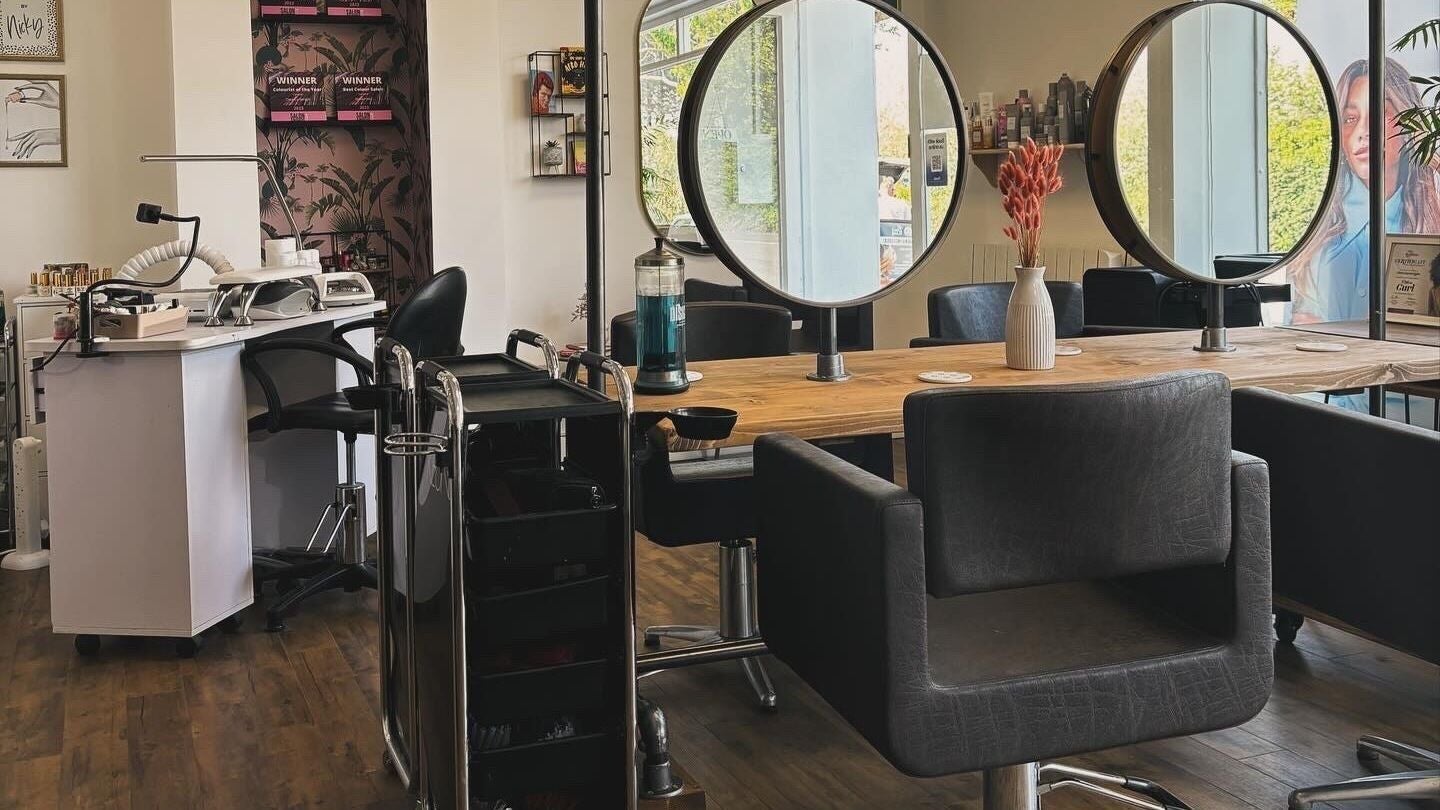Modern salon interior at Elysian Hair - Looe, Cornwall, showcasing sleek design in Looe, England, GB.