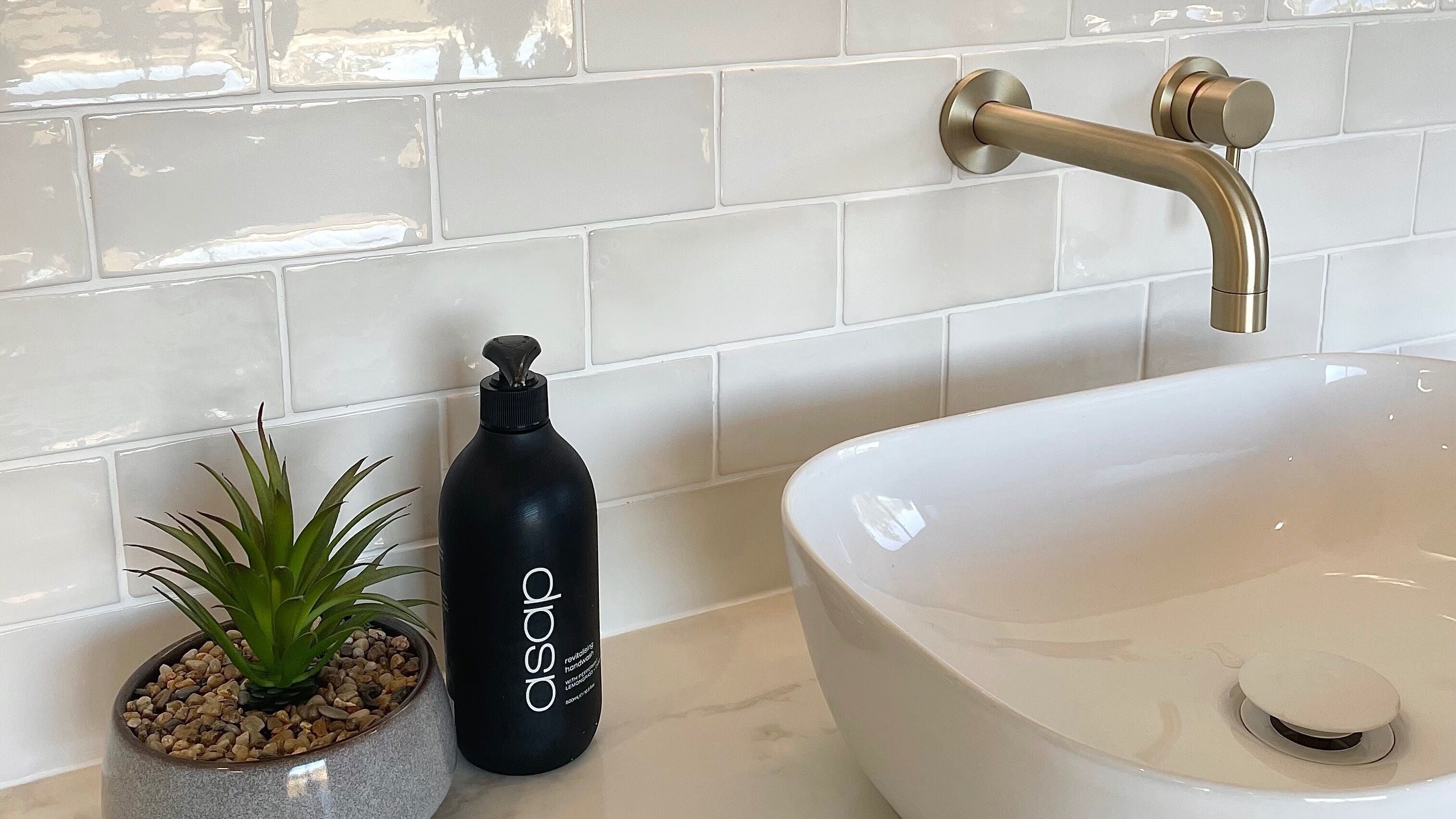 Modern sink setup with elegant brass tap at MJG Artistry, Temora, New South Wales, AU.