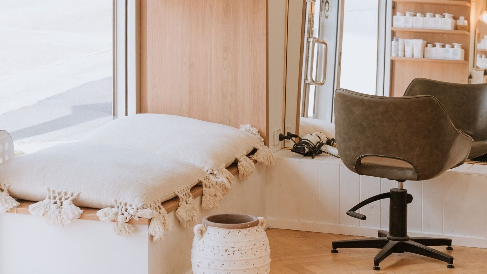 Relaxing salon interior at Beauty and The Fox, Merewether, New South Wales, AU, featuring modern chair and decor.