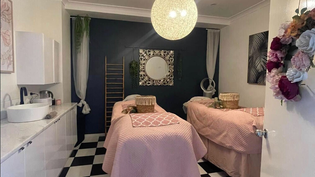 Relaxing treatment room at Spa Semiyahn Skin + Body Retreat, Port Kembla, New South Wales, AU, featuring cozy decor.