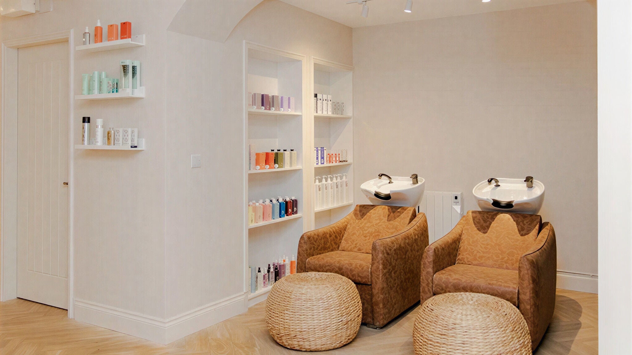 Luxurious hair wash stations at Susan Griffin Hair at The Suite, Mungret, County Limerick, IE with elegant decor.
