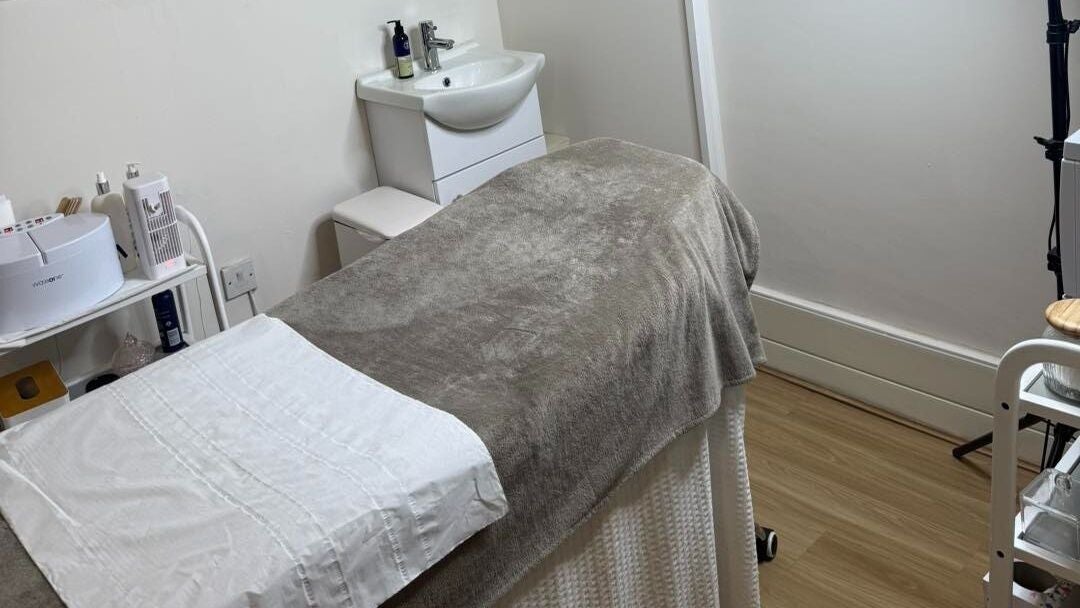 Cozy treatment room at Blush Beauty Suite, Yeadon, England, GB. Features a comfortable bed and stylish decor.