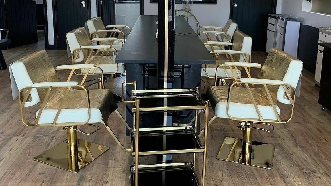 Luxurious salon chairs at Örro Hair and Beauty Salon in Rotherham, England, GB, showcasing modern elegance.