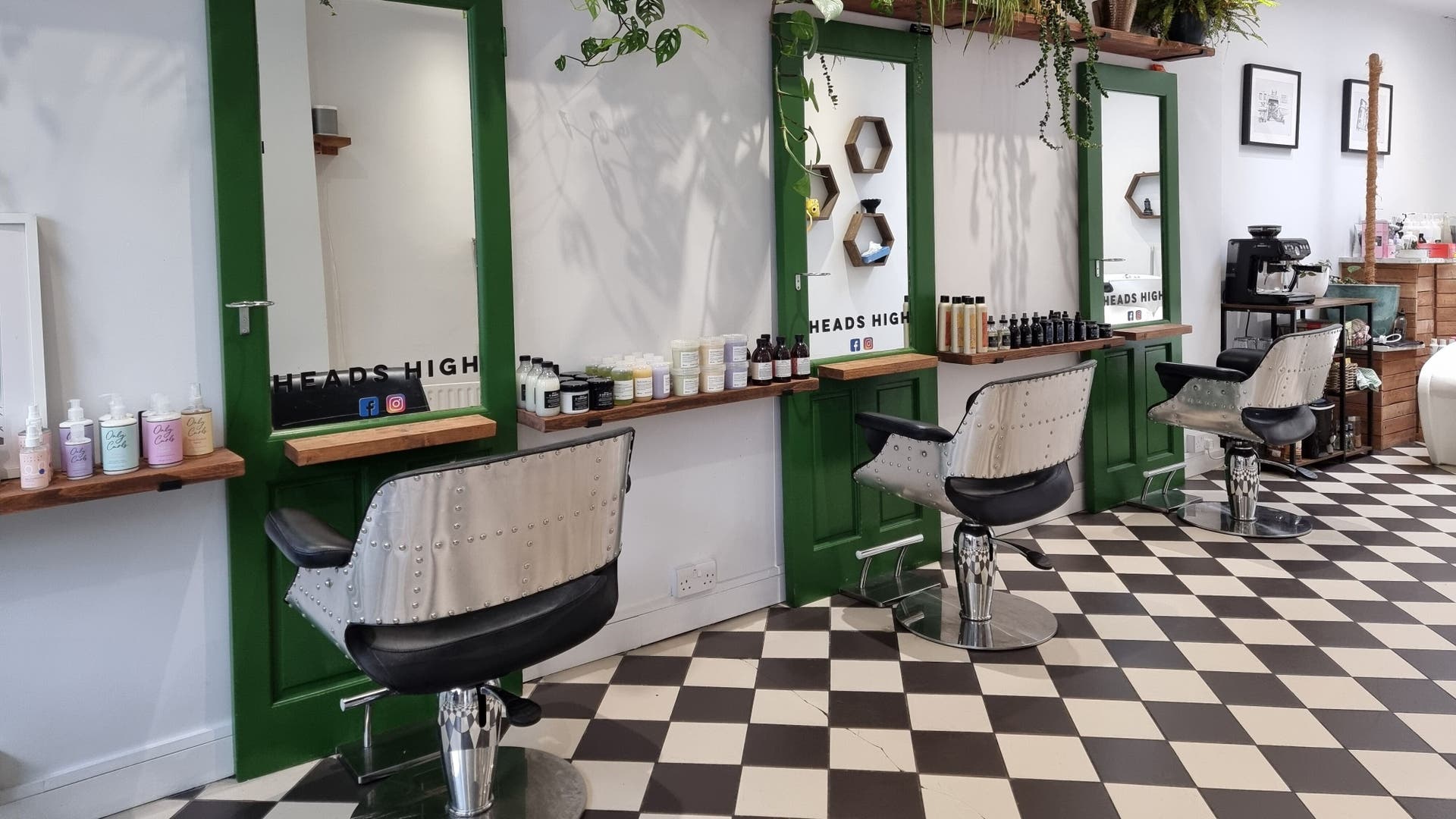 Heads High salon chairs and products in stylish interior, London, England, GB.