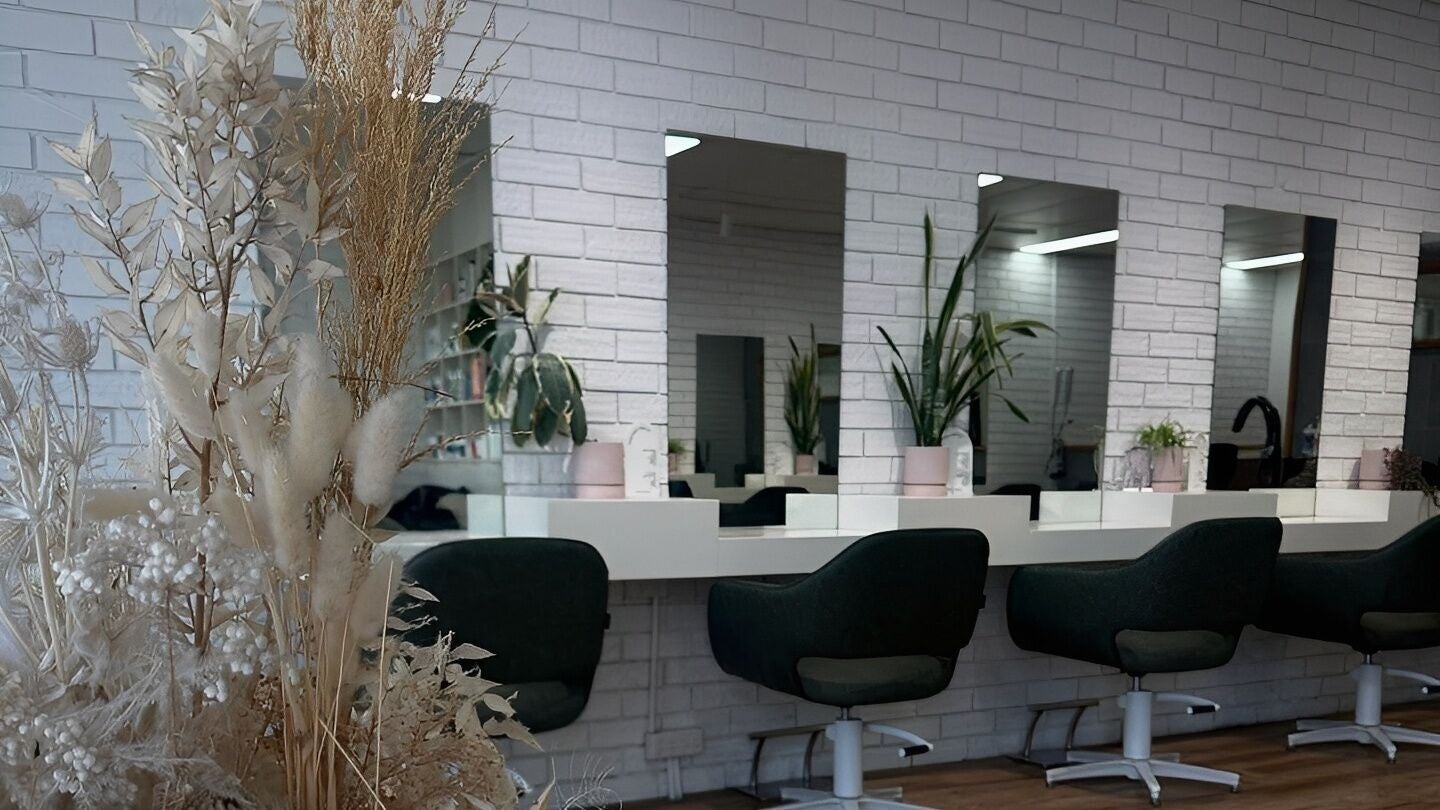 Stylish salon chairs and mirrors at Two Blondes in Melbourne, Victoria, AU create a chic beauty haven.