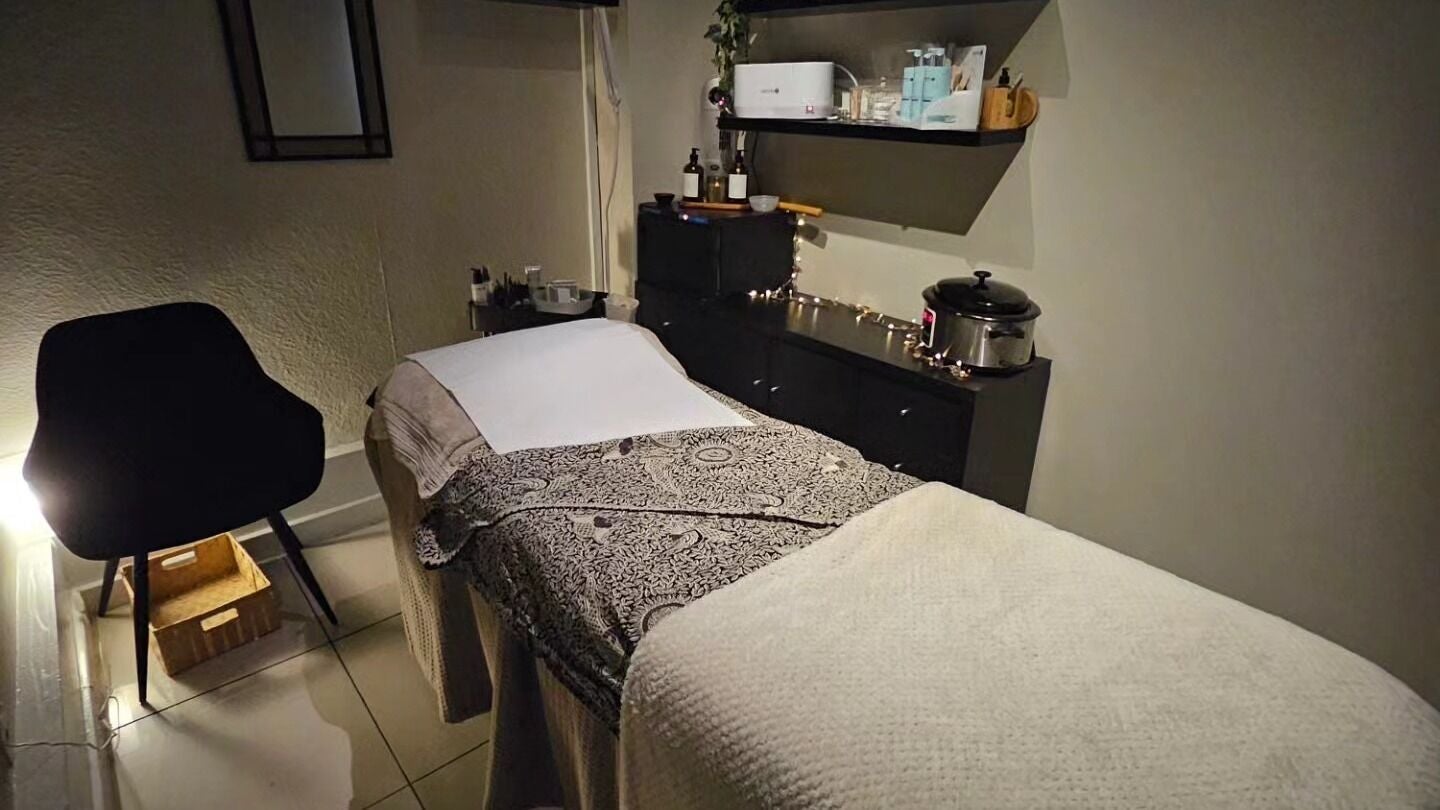 Relaxing therapy room at Divinity - Holistic & Beauty Therapy at HJ Collective, Heywood, England, GB.