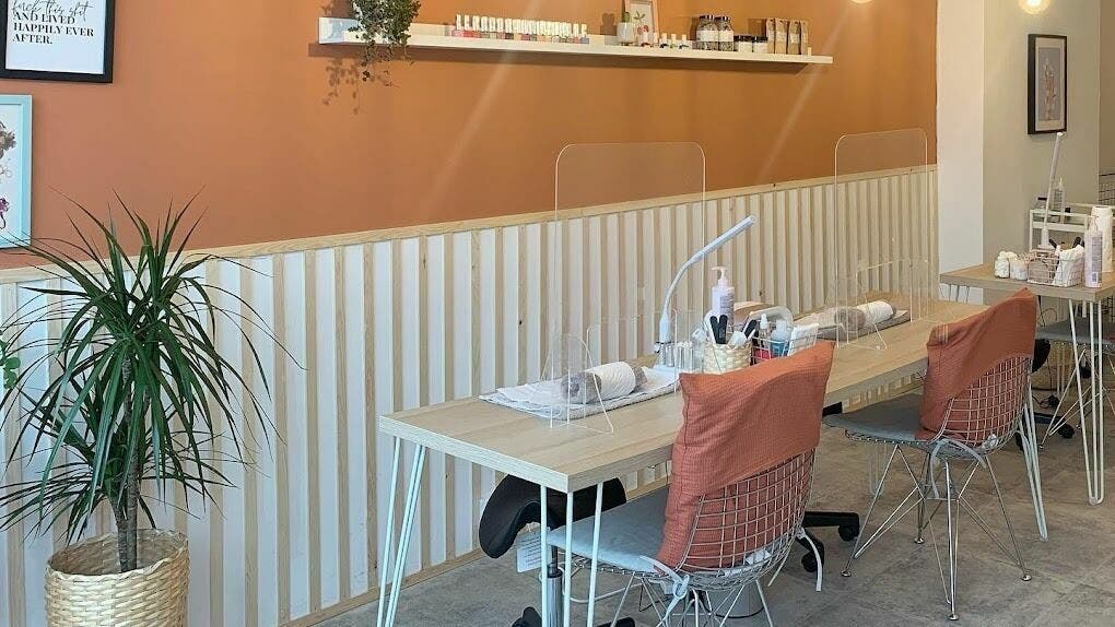 Modern nail studio at Un|Basic, London, England, GB with stylish decor and comfortable seating.
