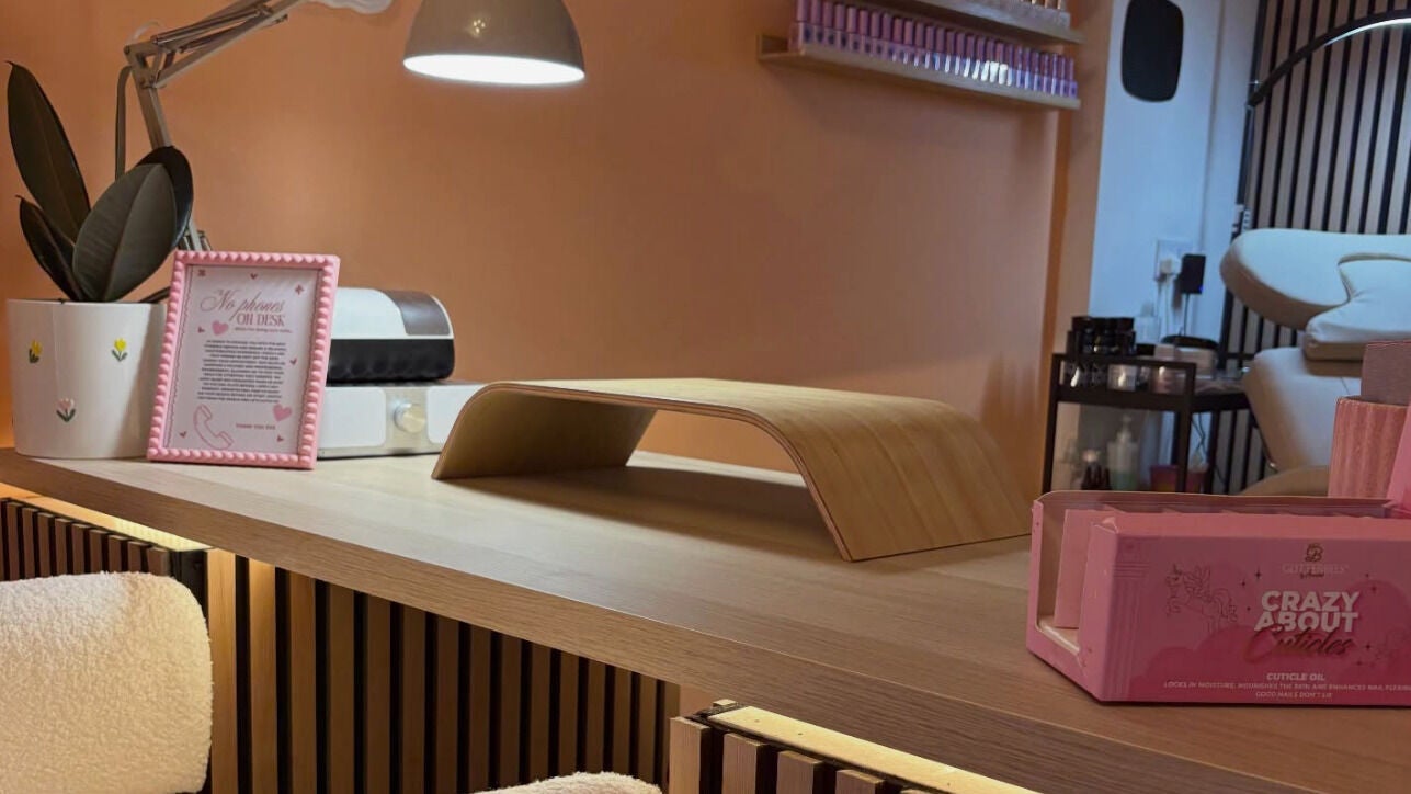 Elegant manicure station at Peaches, Hull, England, GB with ambient lighting and stylish decor.