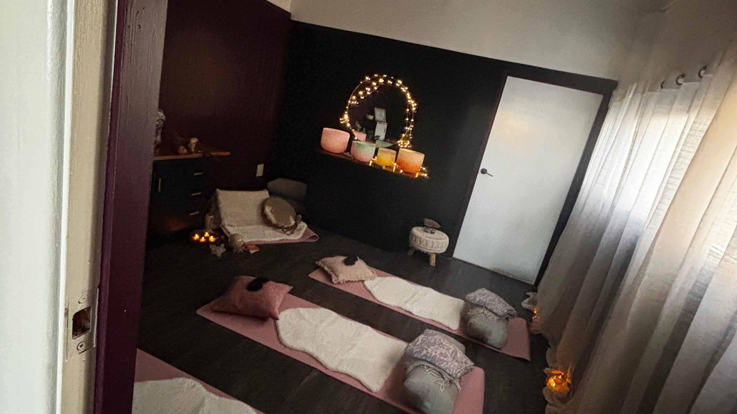 Peaceful meditation room at Sol Nourishments, West End, Queensland, AU, with cushions and soft lighting.