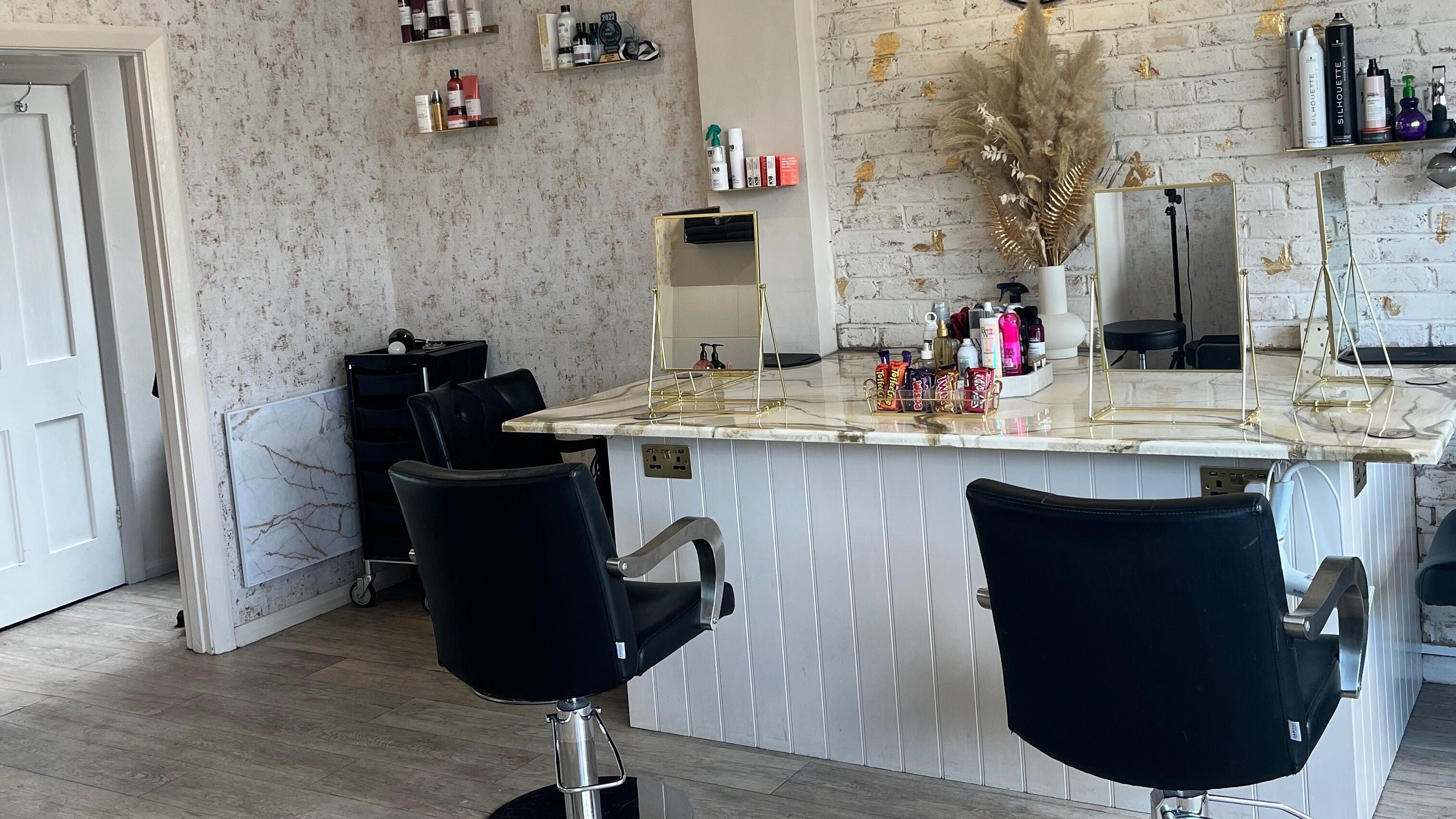 Modern styling chairs and mirrors at Lauren Walder Hair and Extensions in Brighton, England, GB.