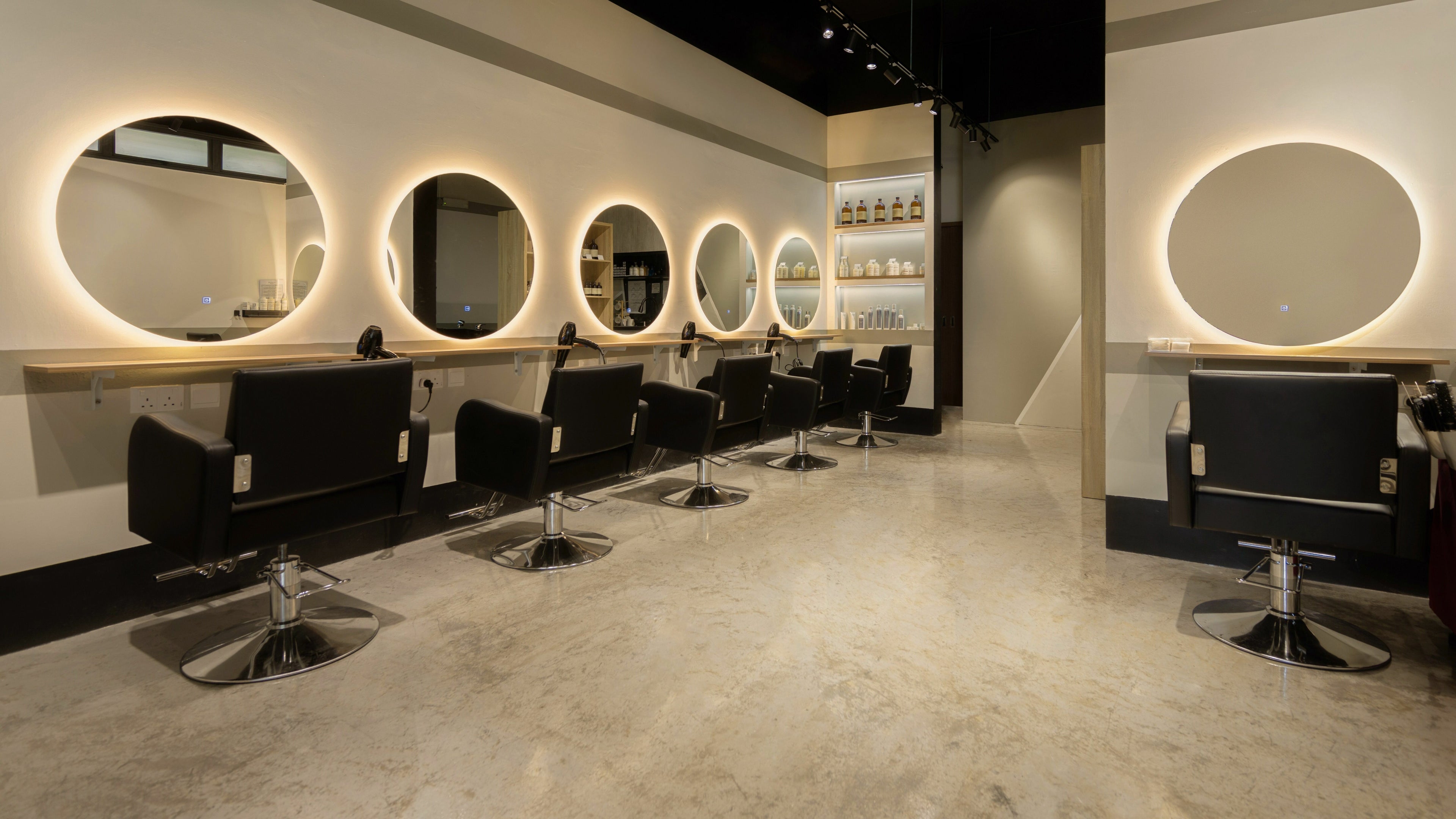 Modern salon chairs and mirrors at Hair by Common Studio - Queenstown, Singapore, Singapore, SG.