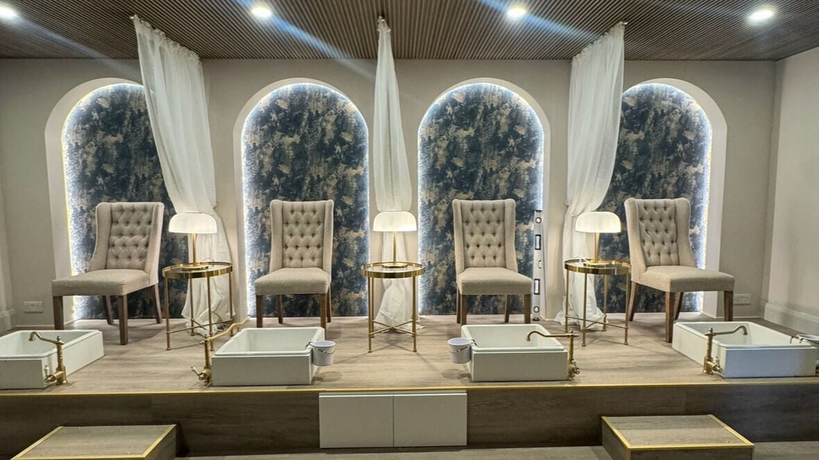 Chic pedicure lounge at Radiant by Hannah Kelly, Athlone, IE, featuring plush chairs and marble basins.