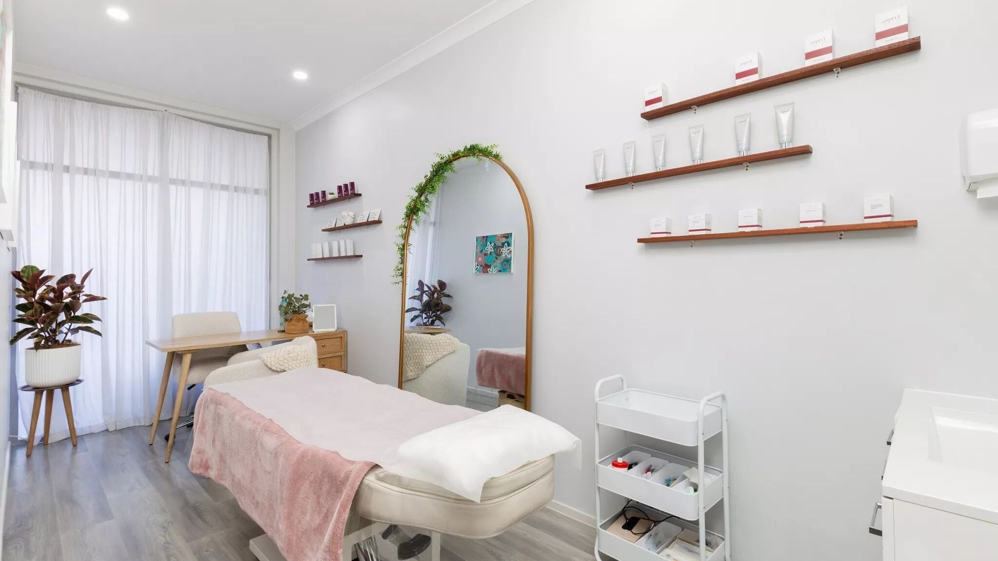 Elegant beauty treatment room at Emerald Lakes, Carrara, Queensland, AU, featuring a serene ambiance and modern decor.