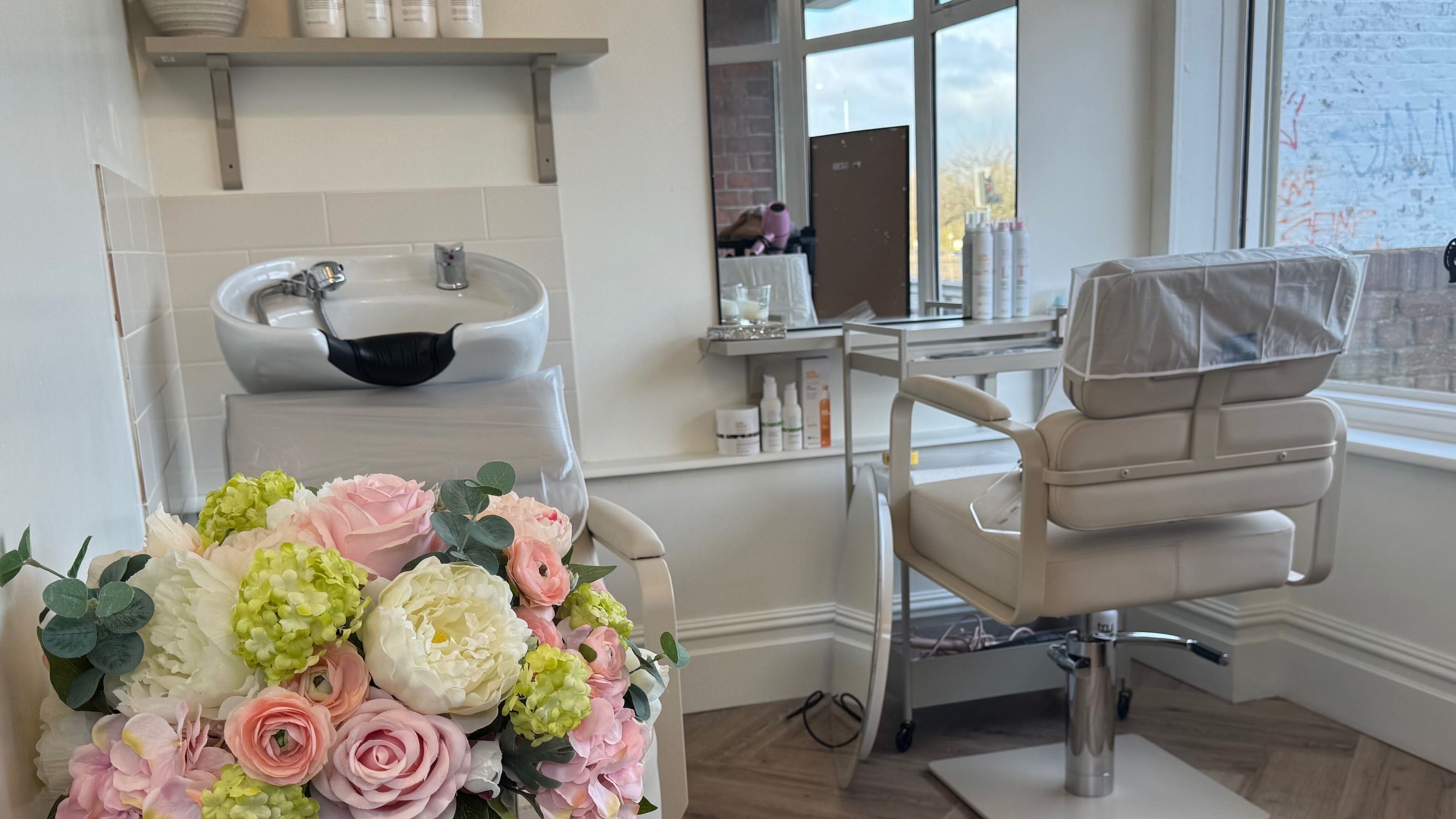 Elegant interior of Skin by Victoria - Skin Clinic, Aesthetics & Hair By Belle in Grays, England, GB with modern seating.