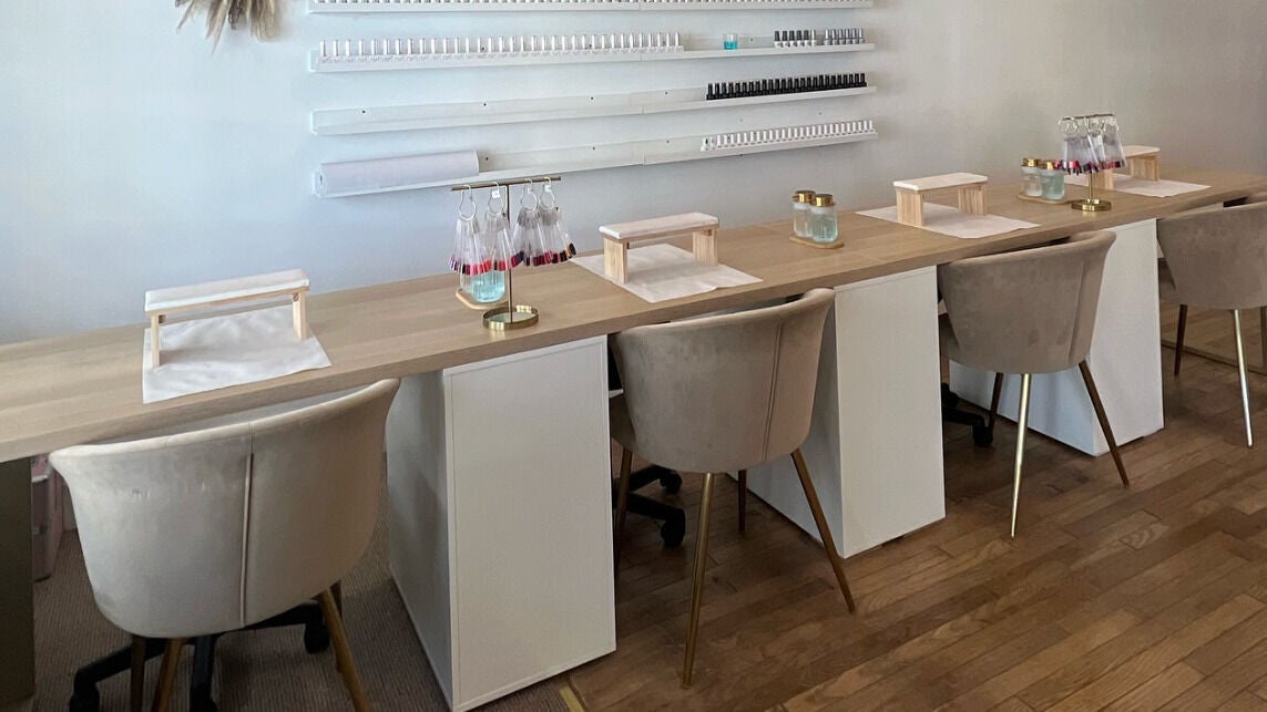 Elegant manicure stations at Abbey Heywood Beauty, Torquay, England, GB, showcasing modern design and comfort.