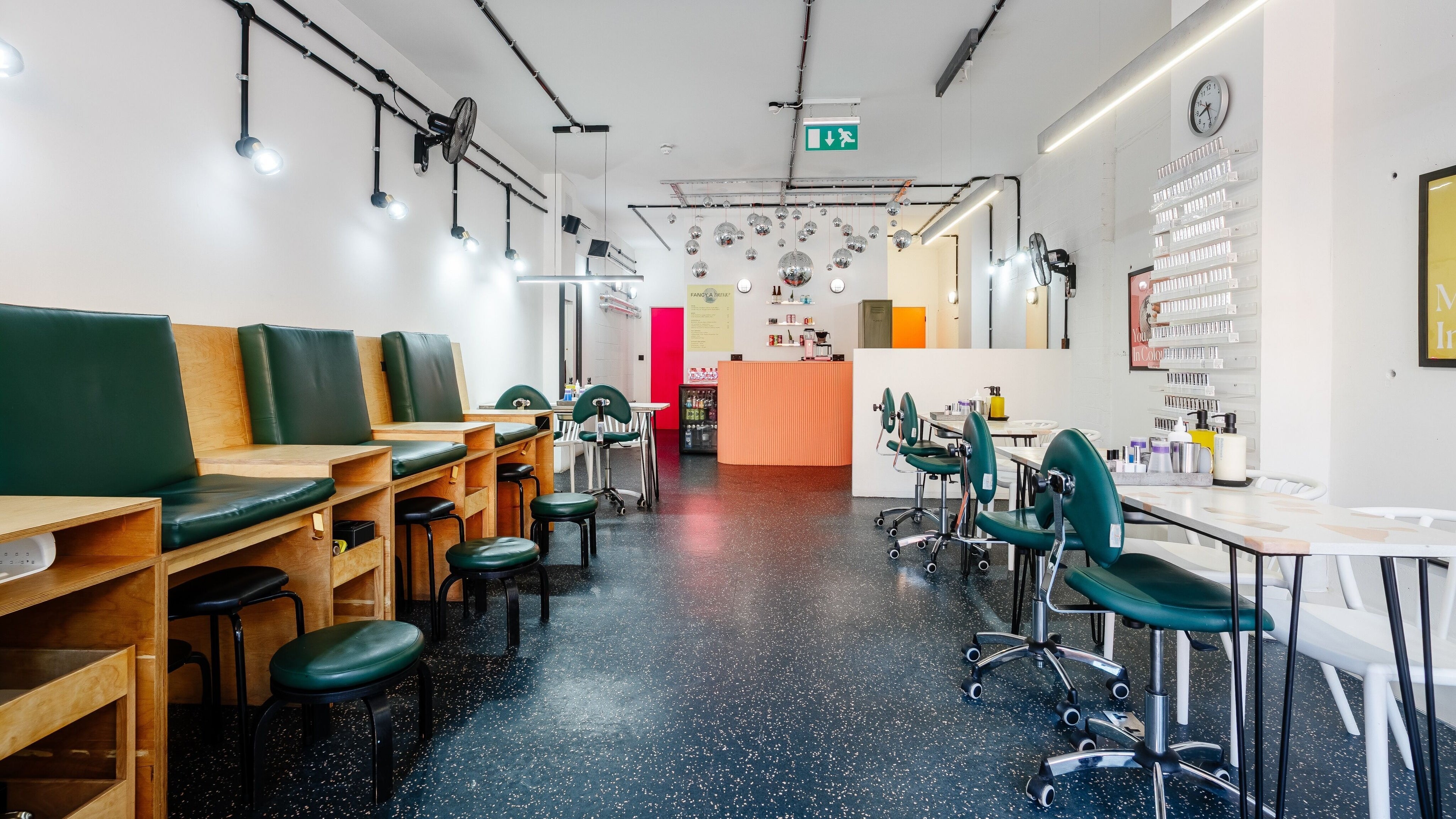 Modern nail salon interior at Shoreditch Nails Dalston, London, England, GB with chic seating and stylish decor.