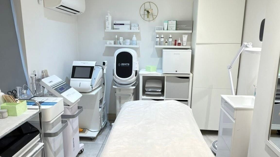 Sleek treatment room at Be Nice Beauty, London, England, GB, featuring modern skincare equipment and a cozy atmosphere.