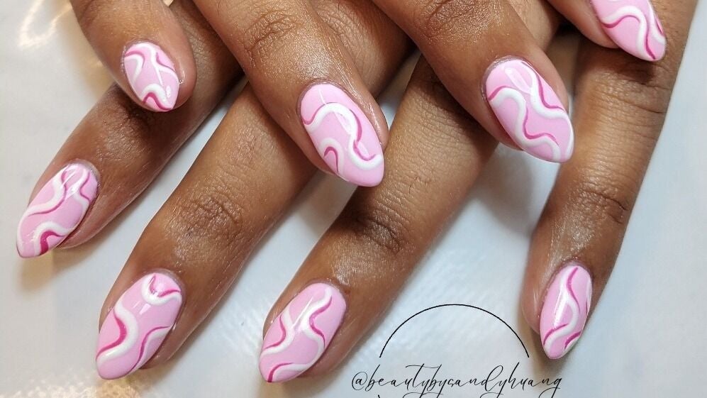 Pink swirled nail art design at The Beauty Flow, Auckland, Auckland, NZ on beautifully manicured nails.