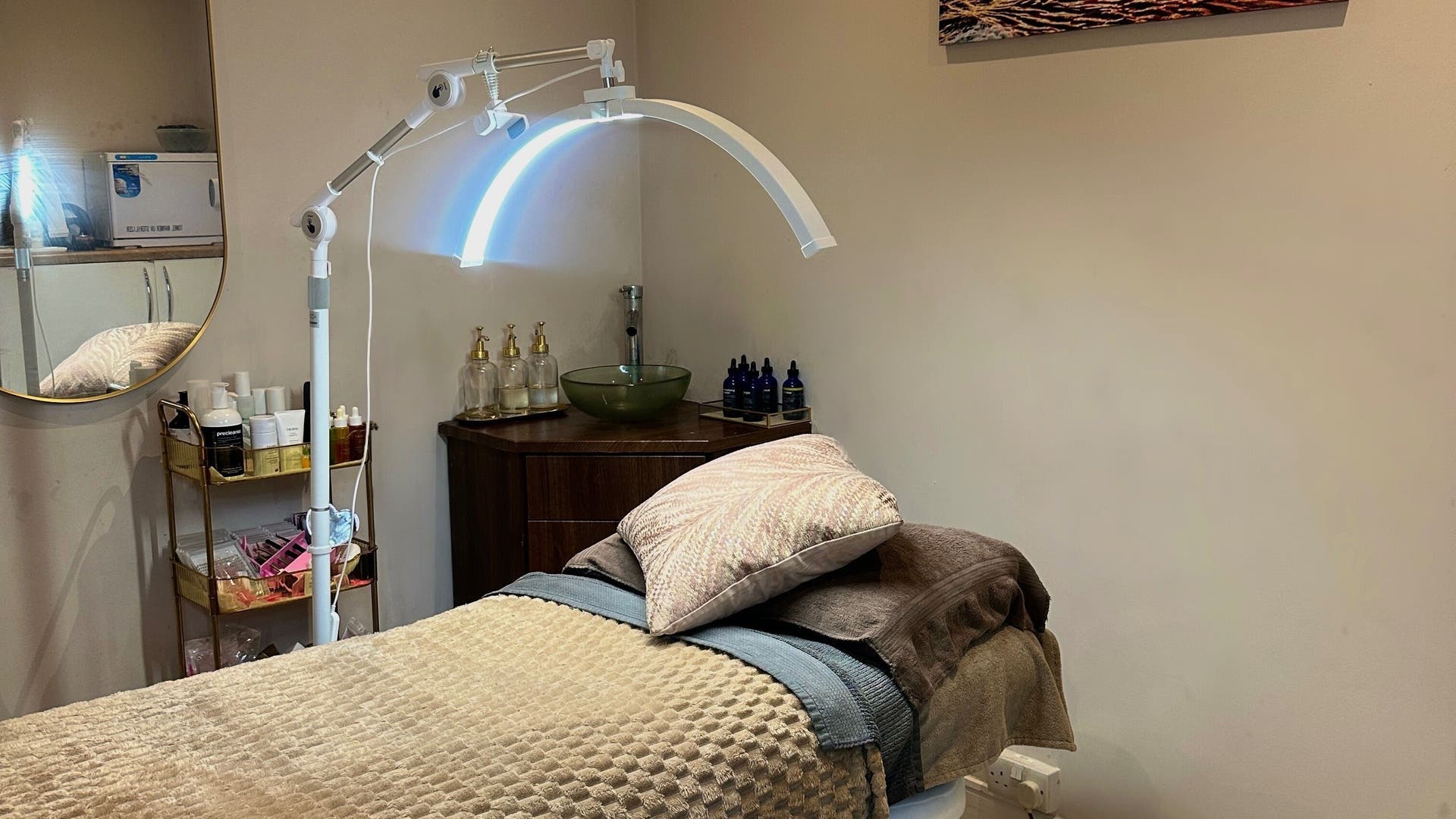 Cozy treatment bed setup at The Beauty Lounge Elmfield, South Croydon, England, GB, with elegant decor.