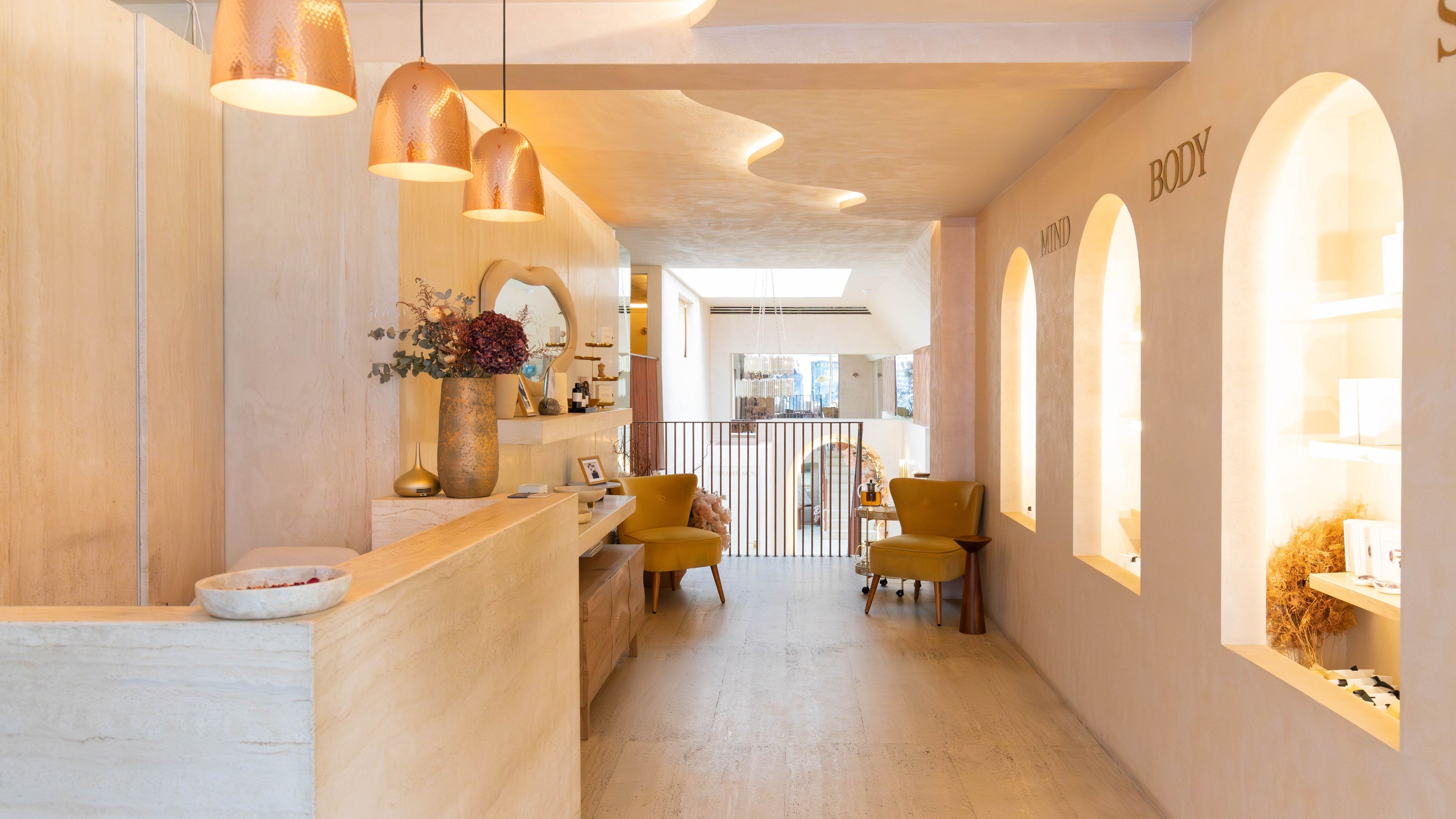 Elegant interior of Dimple Amani Knightsbridge in London, England, GB, showcasing a tranquil and stylish reception area.