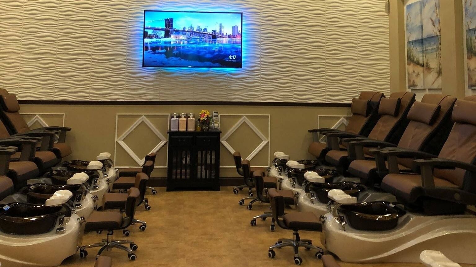 Luxurious pedicure chairs at Oasis Nails Spa Windermere in Orlando, Florida, US offer relaxation and comfort.