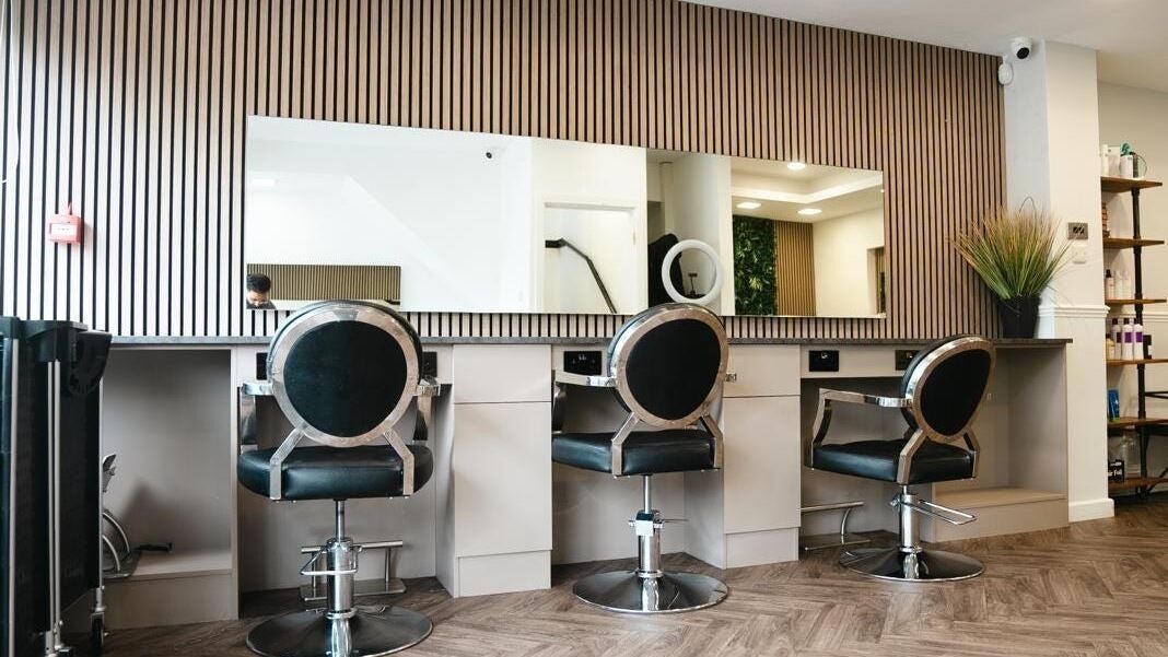 Modern salon styling chairs at VP Hair Art Co Sutton, Birmingham, England, GB with sleek, minimalist design.
