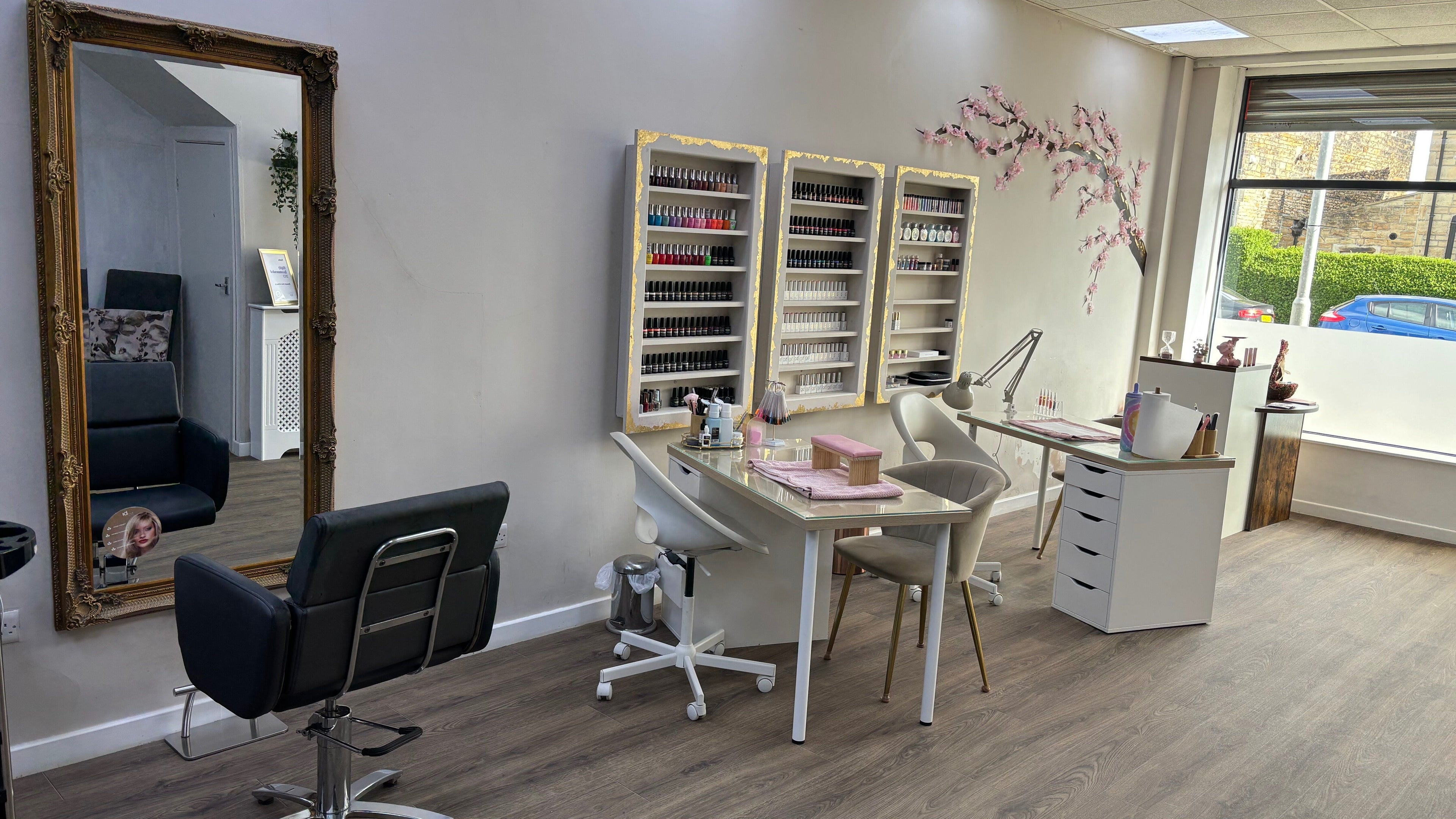 Sophisticated nail bar at Blossom Hair & Beauty in Cleckheaton, England, GB with stylish seating and decor.