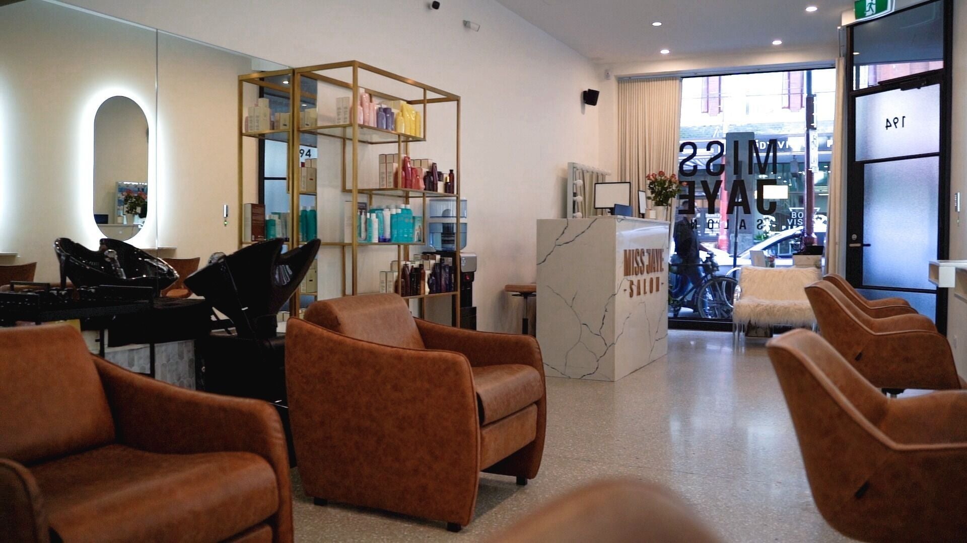 Modern salon interior at Miss Jaye x Hair stylist in Prahran, Victoria, AU with chic seating and decor.
