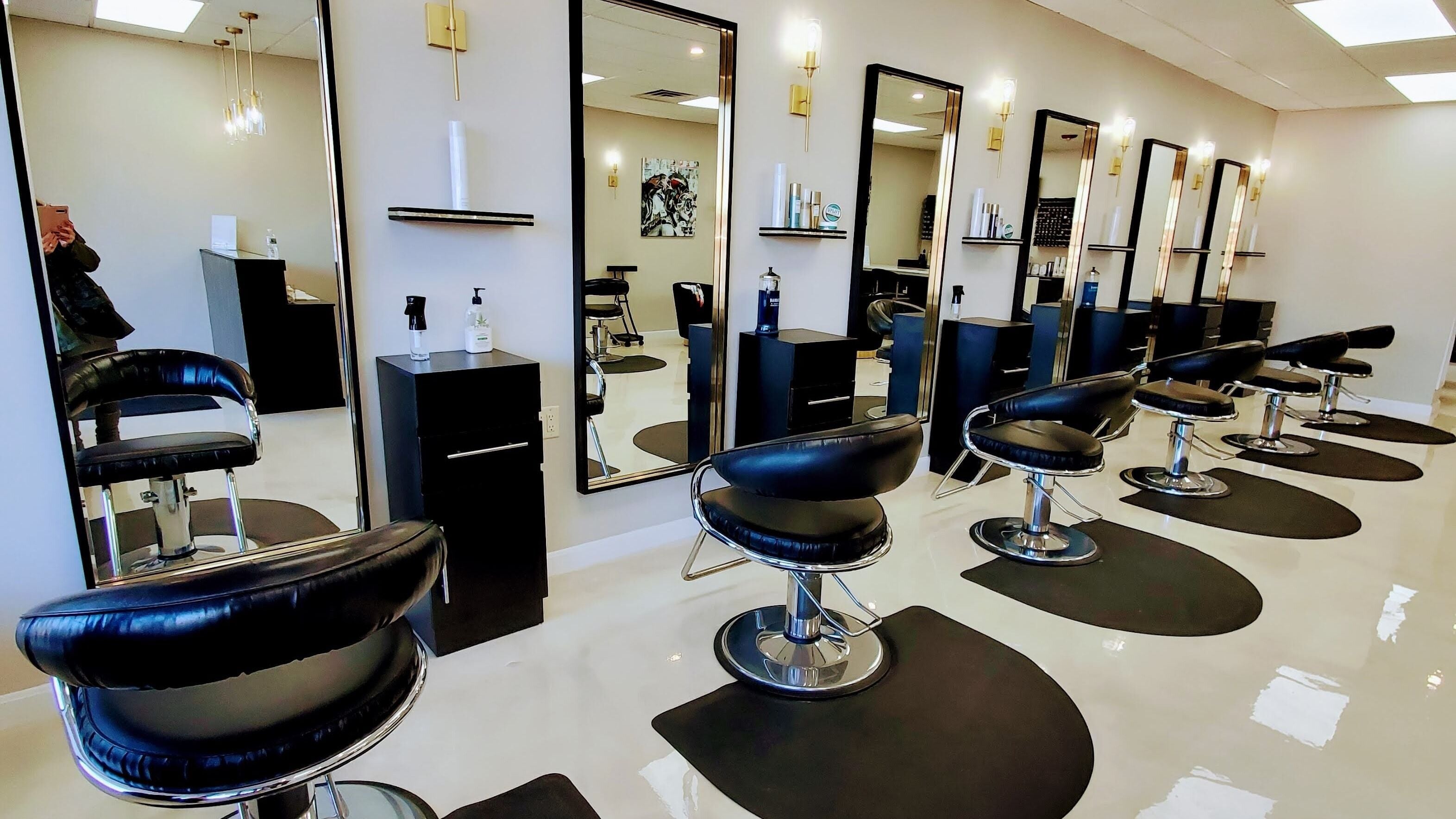 Stylish salon interior with modern chairs at Salon Secora, Saugus, Massachusetts, US.