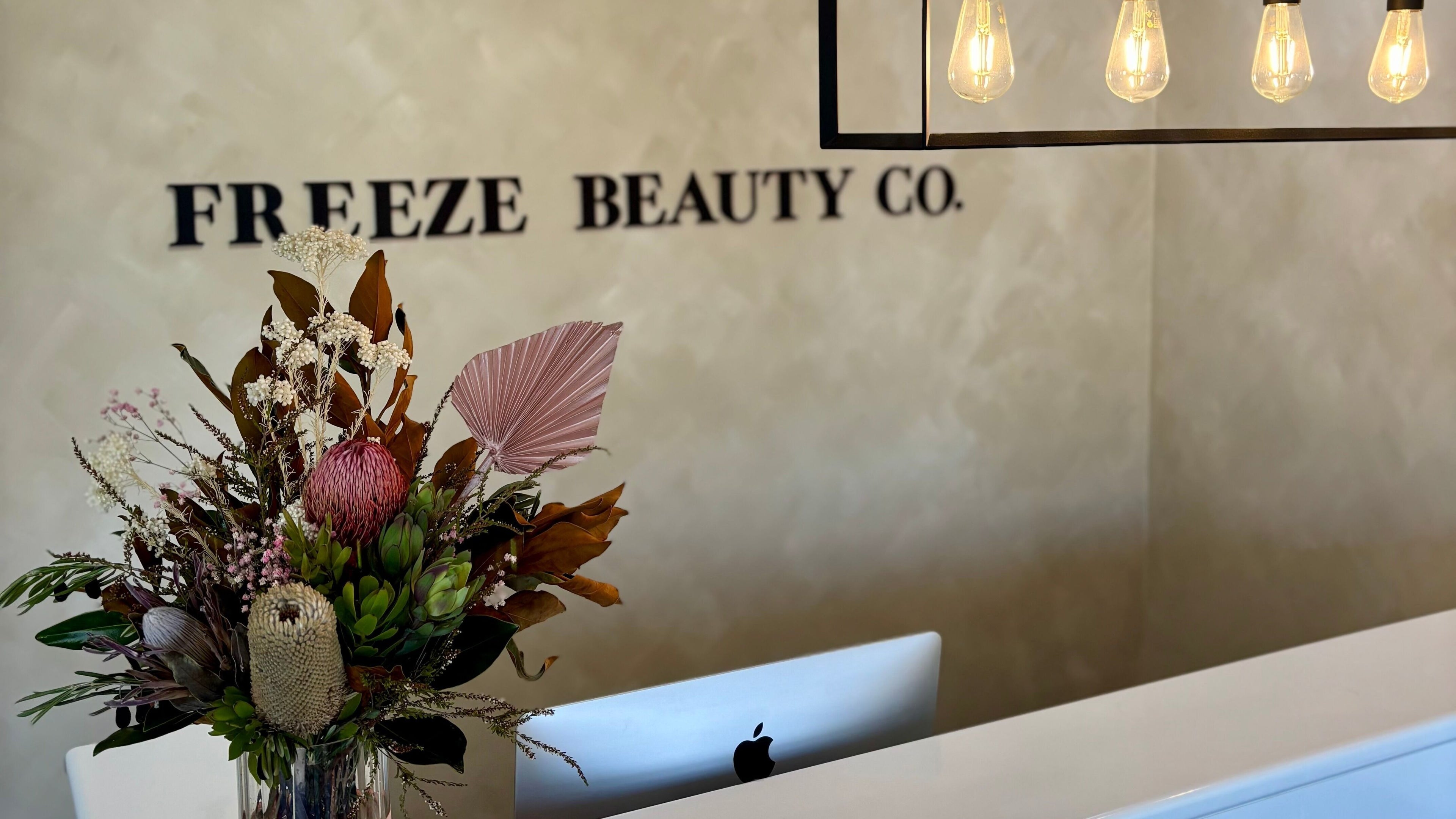 Elegant floral display at Freeze Beauty Co. Bulimba reception, Bulimba, Queensland, AU.