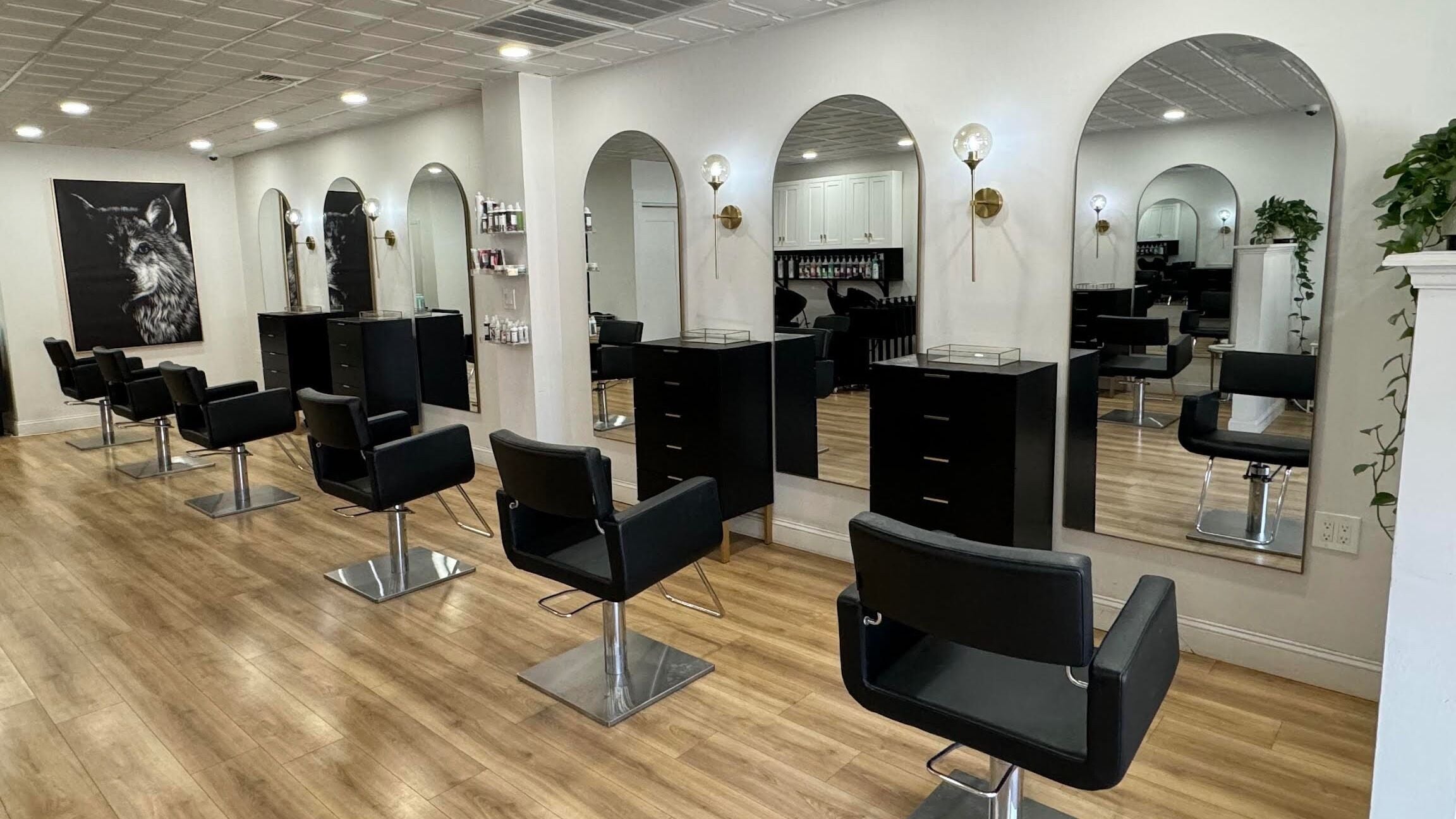 Elegant salon chairs at Isla and Wolf Beauty in Saint James, New York, US.