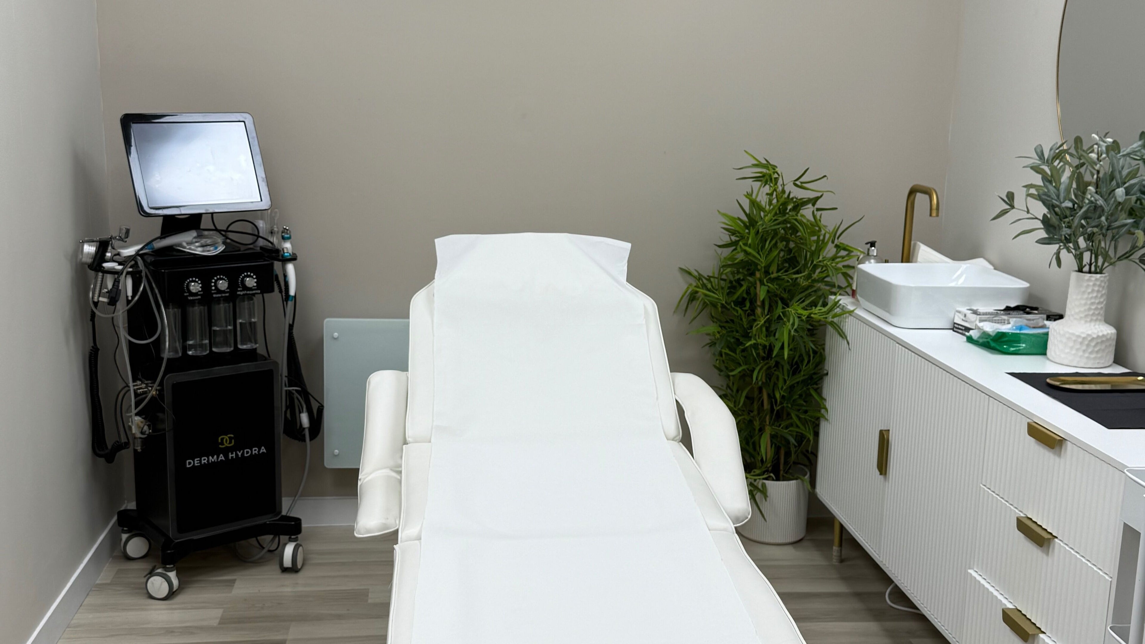 Tranquil treatment room at House of Synergy - Bexley, showcasing modern equipment and minimalist decor in Bexley, England, GB.