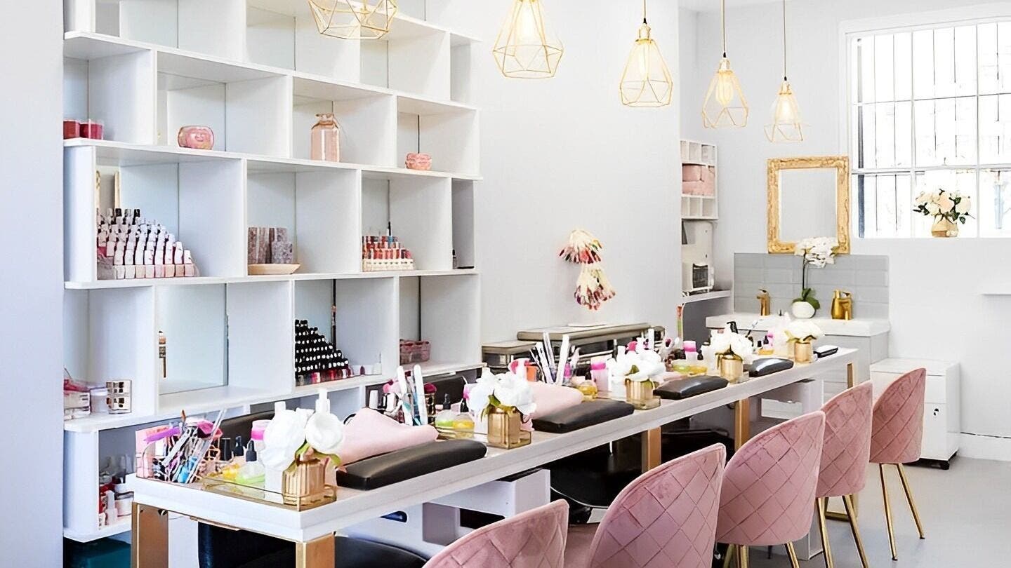 Stylish interior of NailBase London, a beauty venue in London, England, GB, featuring elegant manicure stations.