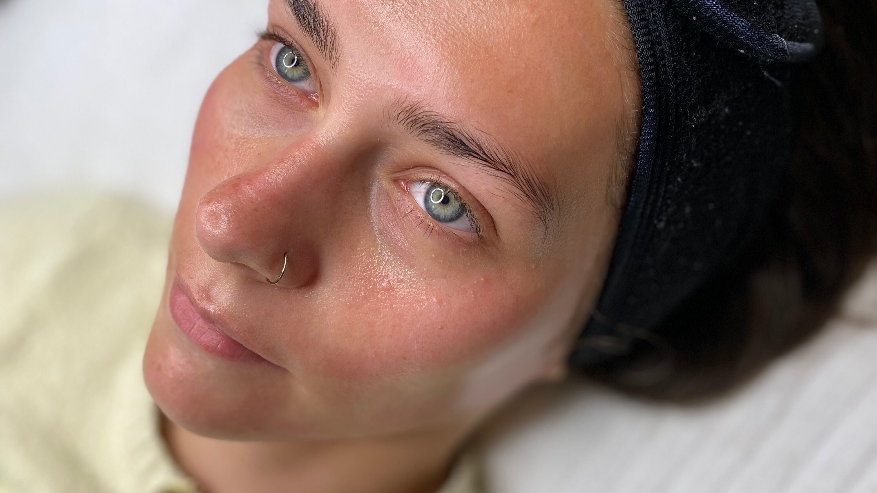 Close-up of a relaxed customer enjoying skincare at Peak In Beauty, Combs, England, GB.