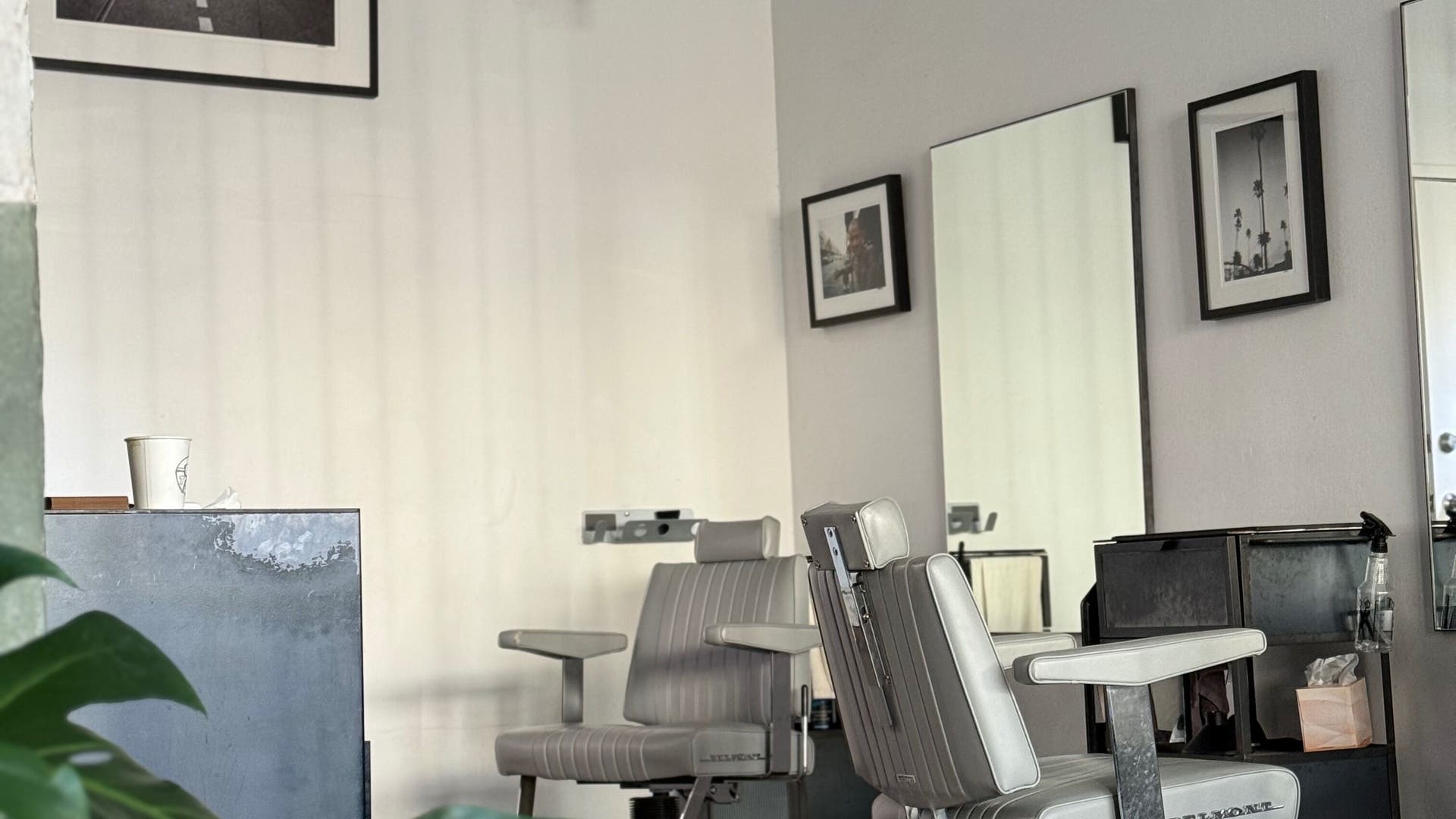 Chic barber chair at Brother Wolf St Kilda, Melbourne, Victoria, AU. Minimalist design for a premium experience.