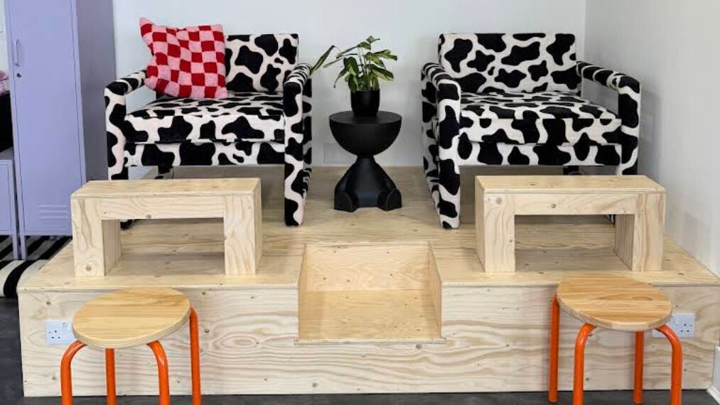 Stylish cow-print seating area at Just Lols, Saint-helier, St Helier, JE, offering unique beauty and wellness ambiance.