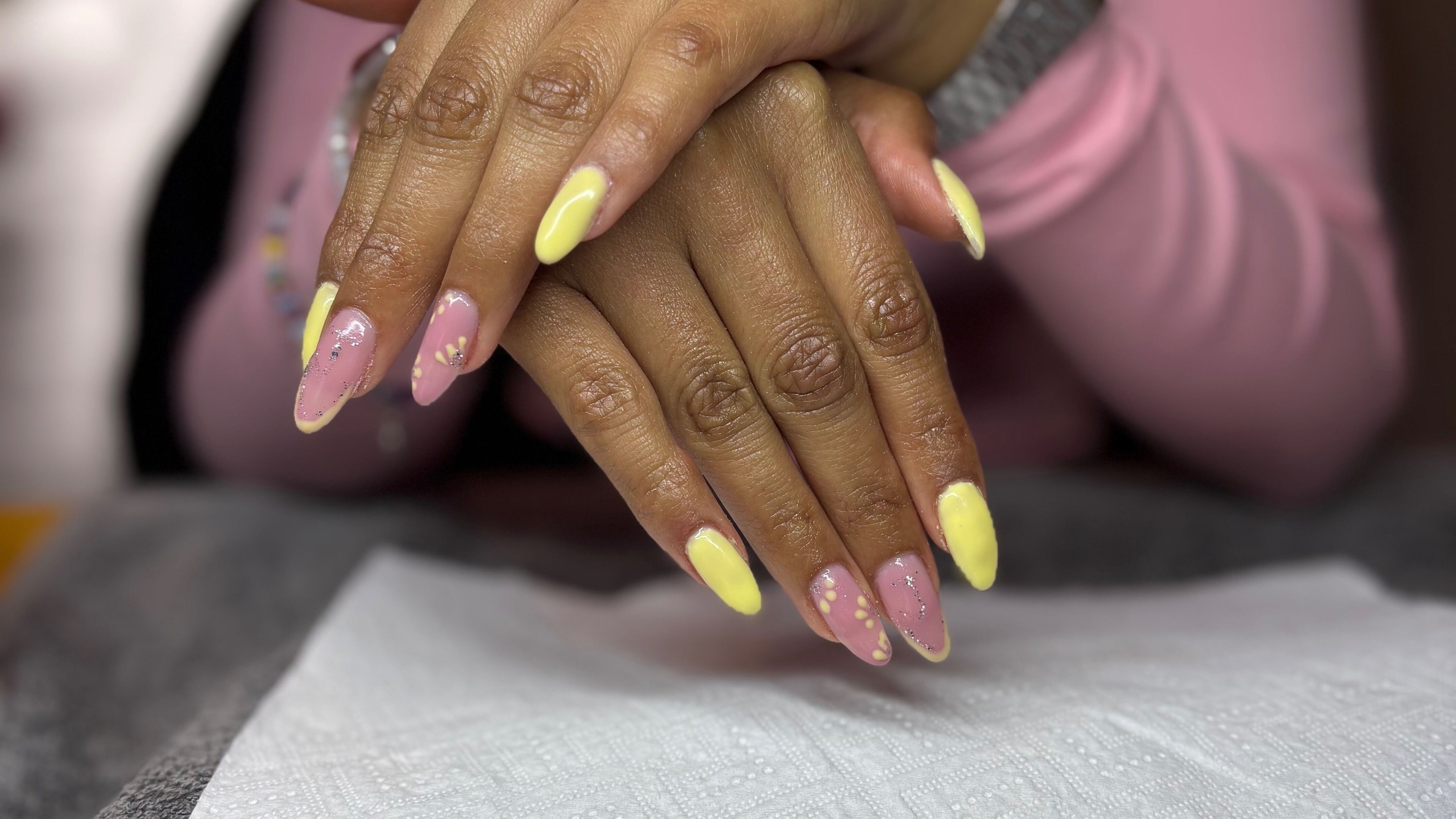 Vibrant pastel manicure at The Beauty Box, Cape Town, Western Cape, ZA. Nail art with pink and yellow tones.