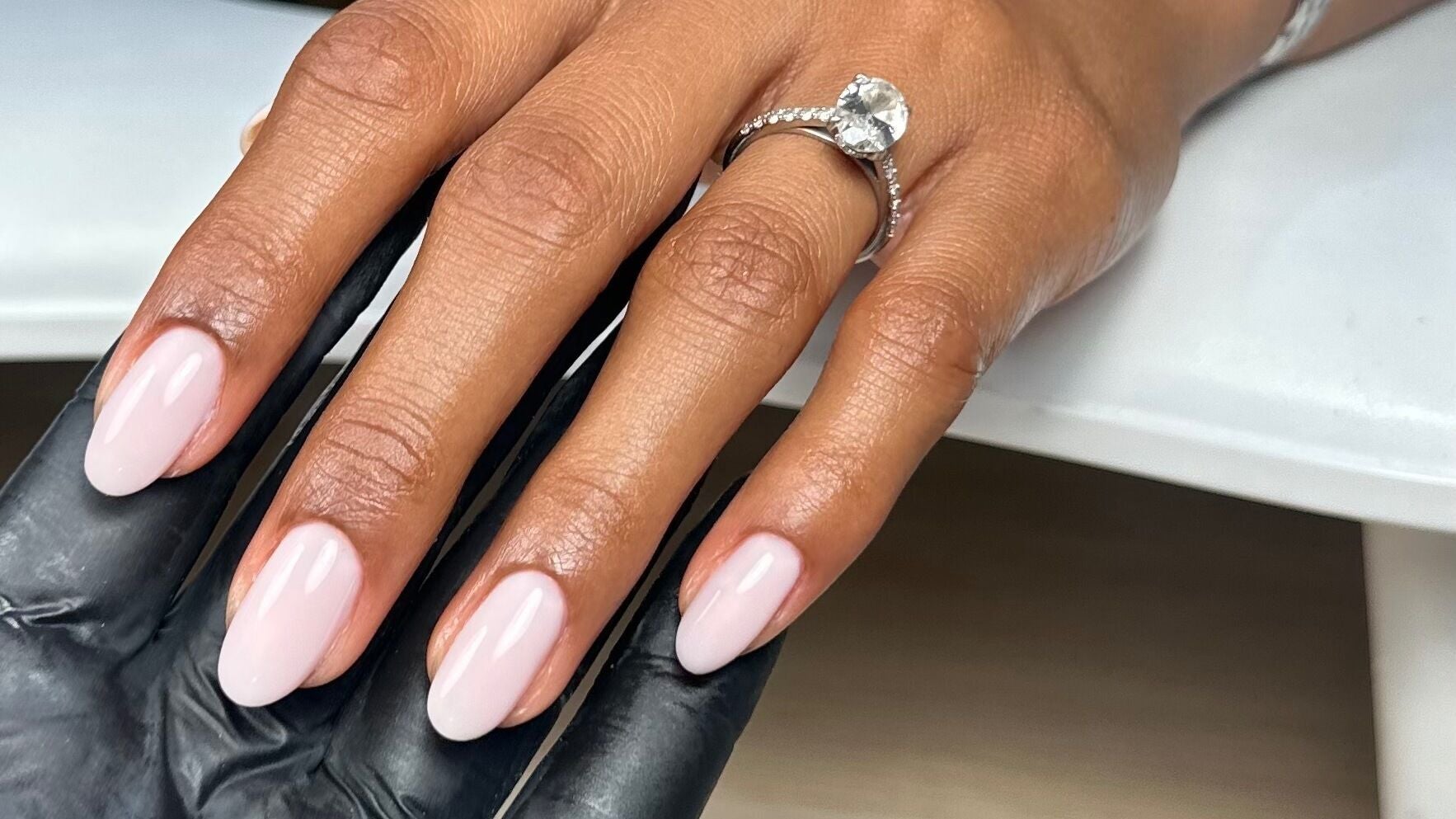 Elegant nail art at Nails By Cátia Patrícia, Edgware, England, GB showcasing polished, oval-shaped nails.