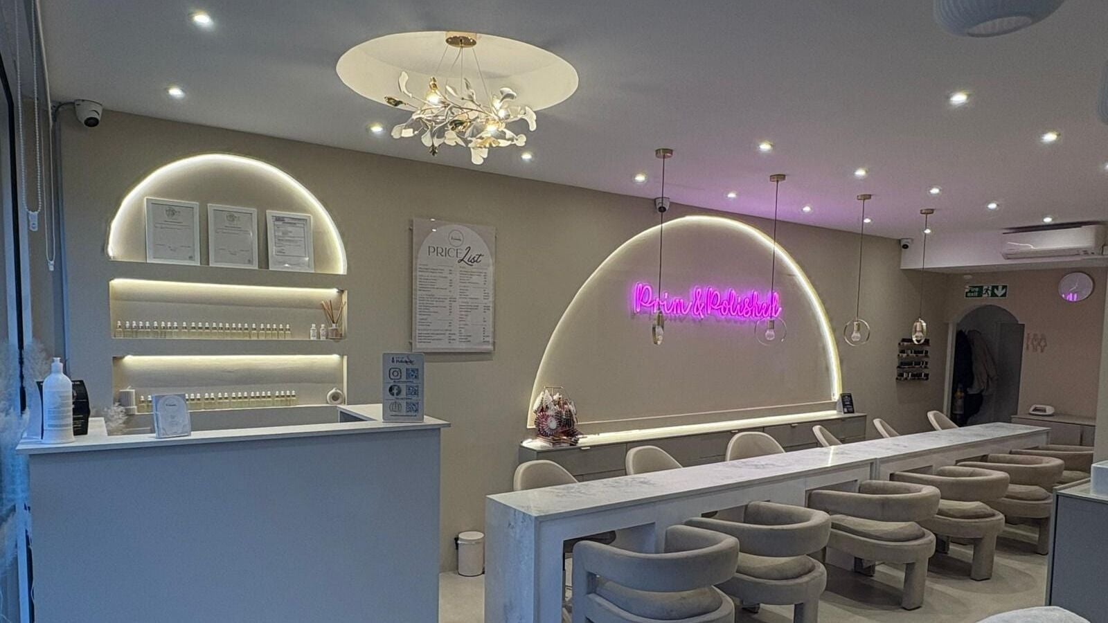 Elegant interior of Prim and Polished in Bexleyheath, England, GB with modern decor and ambient lighting.