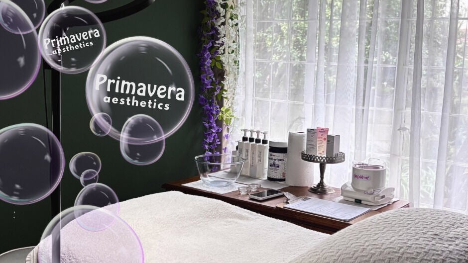 Calm treatment room at Primavera Aesthetics, Centurion, Gauteng, ZA, with beauty products on display.