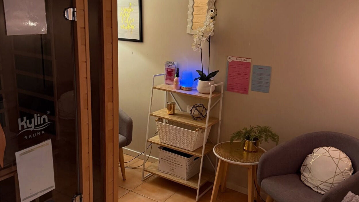 Relaxing seating area at Aspley - A1 Colon Hydrotherapy in Aspley, Queensland, AU with decor and sauna view.