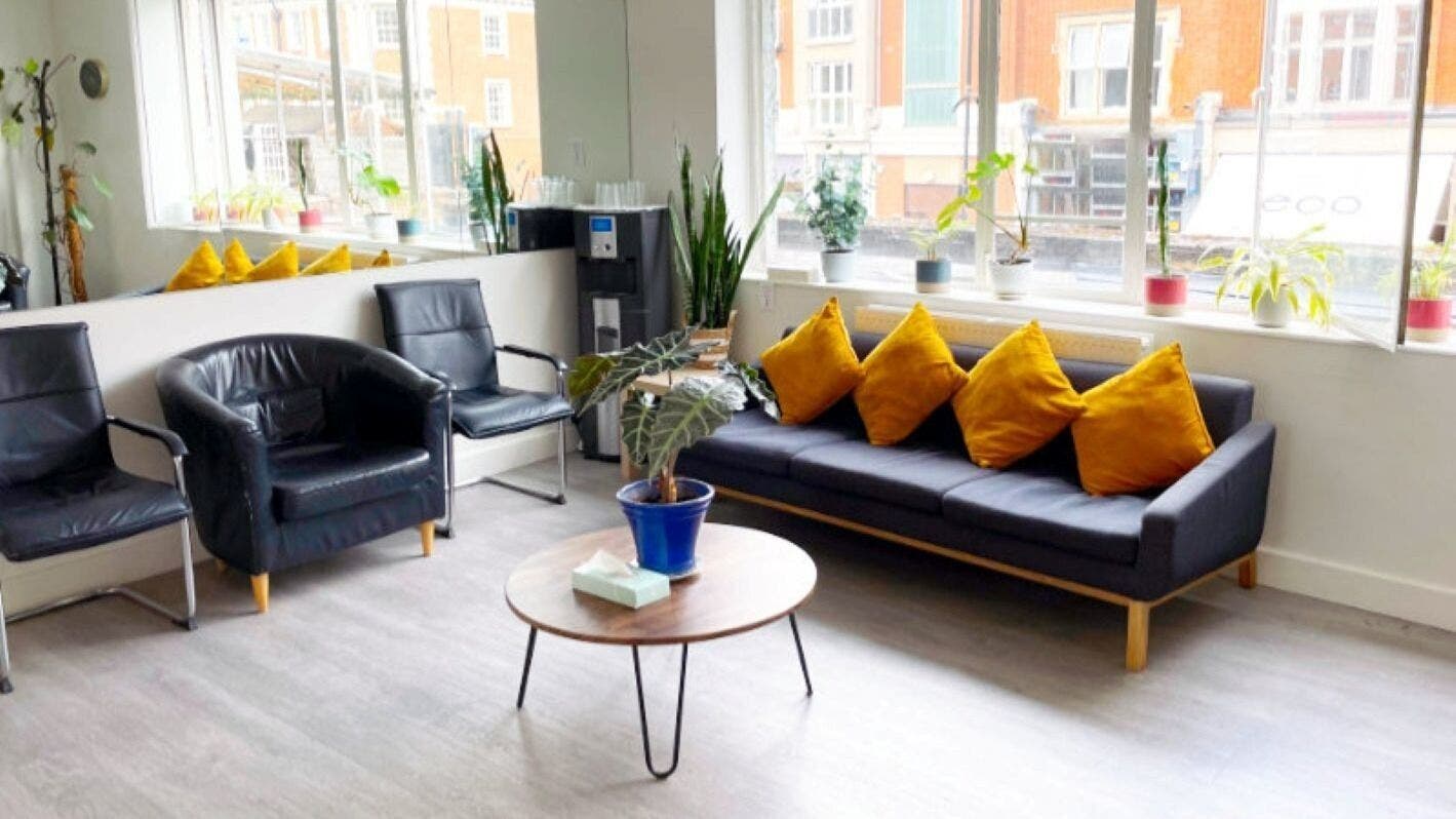 Bright lounge at Danugur Clapham-Stockwell in London, England, with modern seating and vibrant decor.